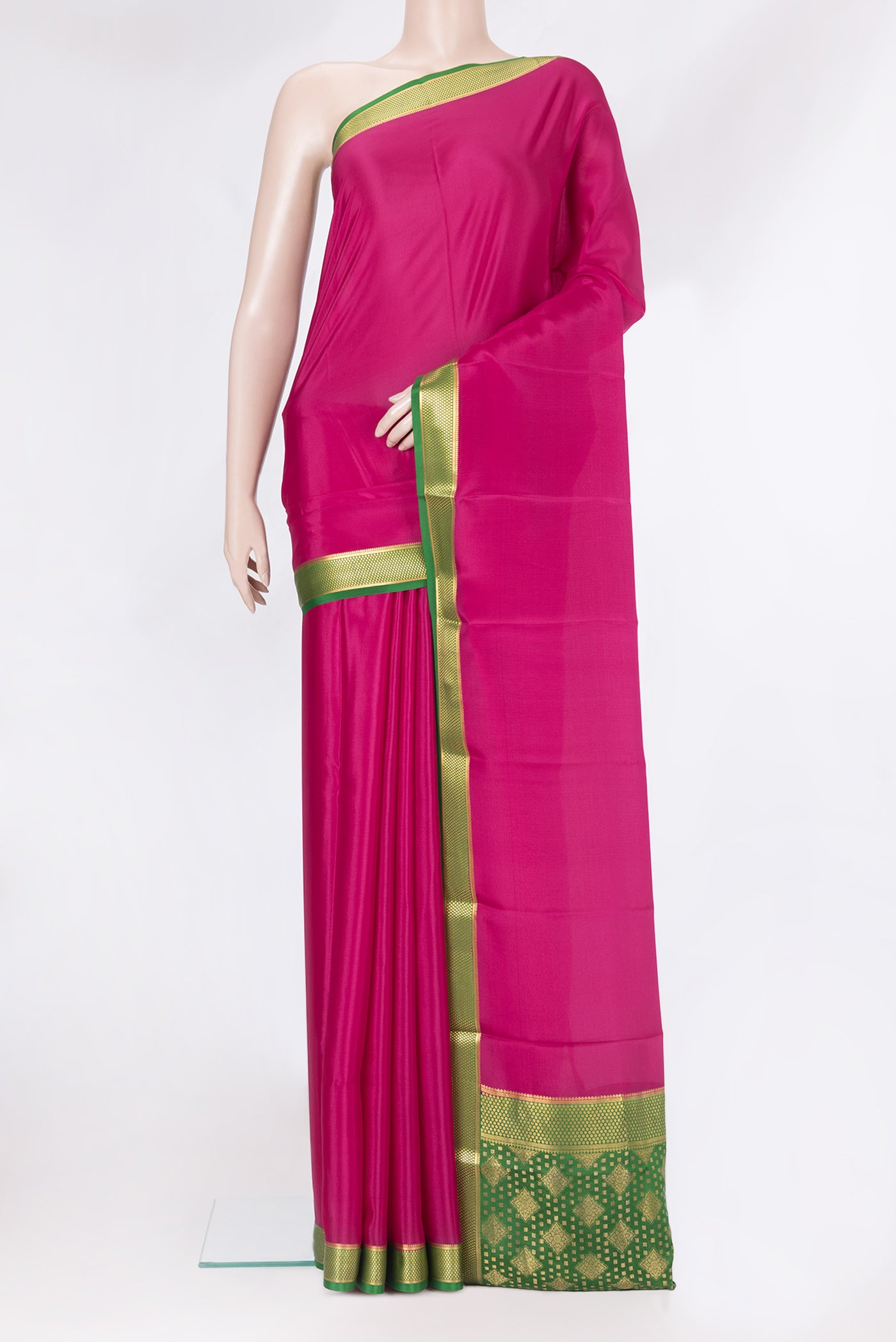 Magenta Mysore Silk Saree with Plain Body and Zari Border.  displayed on a mannequin