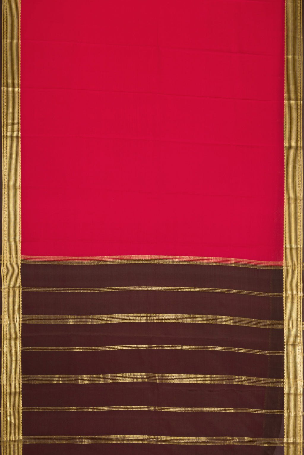 Maroon Dual Tone Mysore Crepe Saree with Plain Body and Zari Border.  displayed on a mannequin