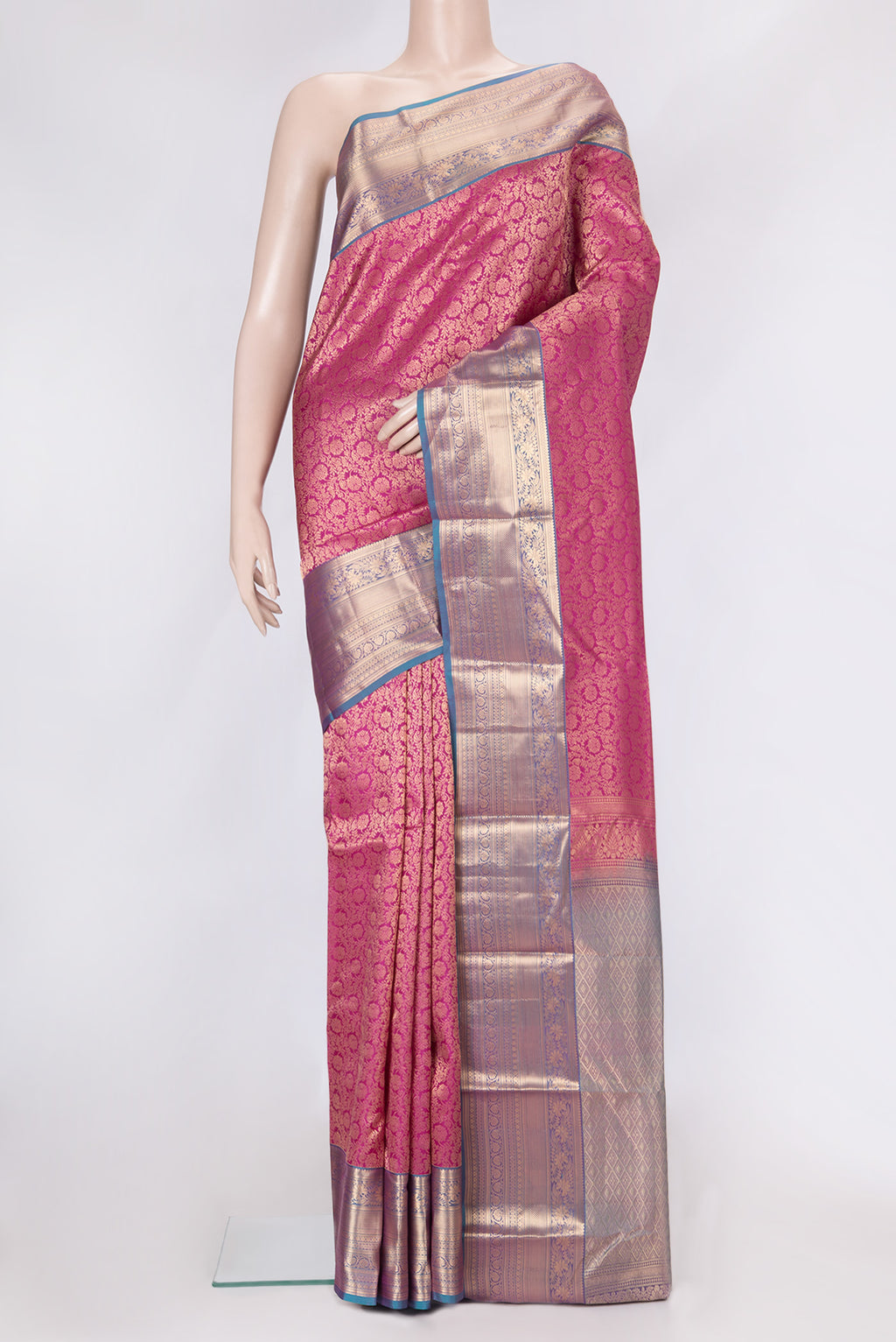 Pink Dual Tone Kanchipuram Silk Saree with Zari Brocade on the body and Zari Border.  displayed on a mannequin
