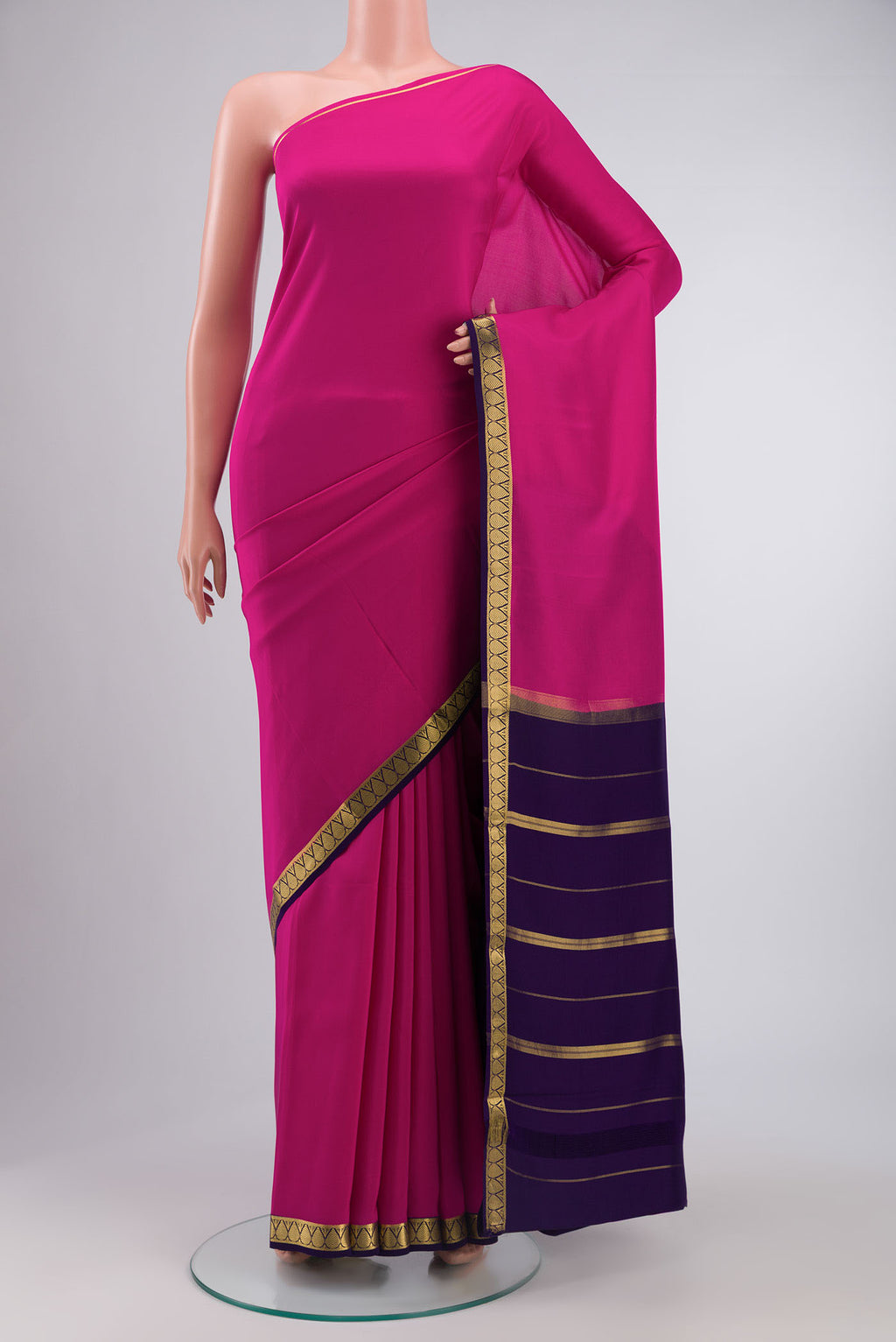 Pure Silk Pure Zari Pink Mysore Crepe Saree with Plain Body and Zari Border displayed on a mannequin