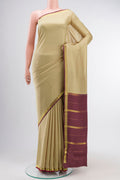 Pure Silk Pure Zari Beige Mysore Crepe Saree with Plain Body and Zari Border displayed on a mannequin