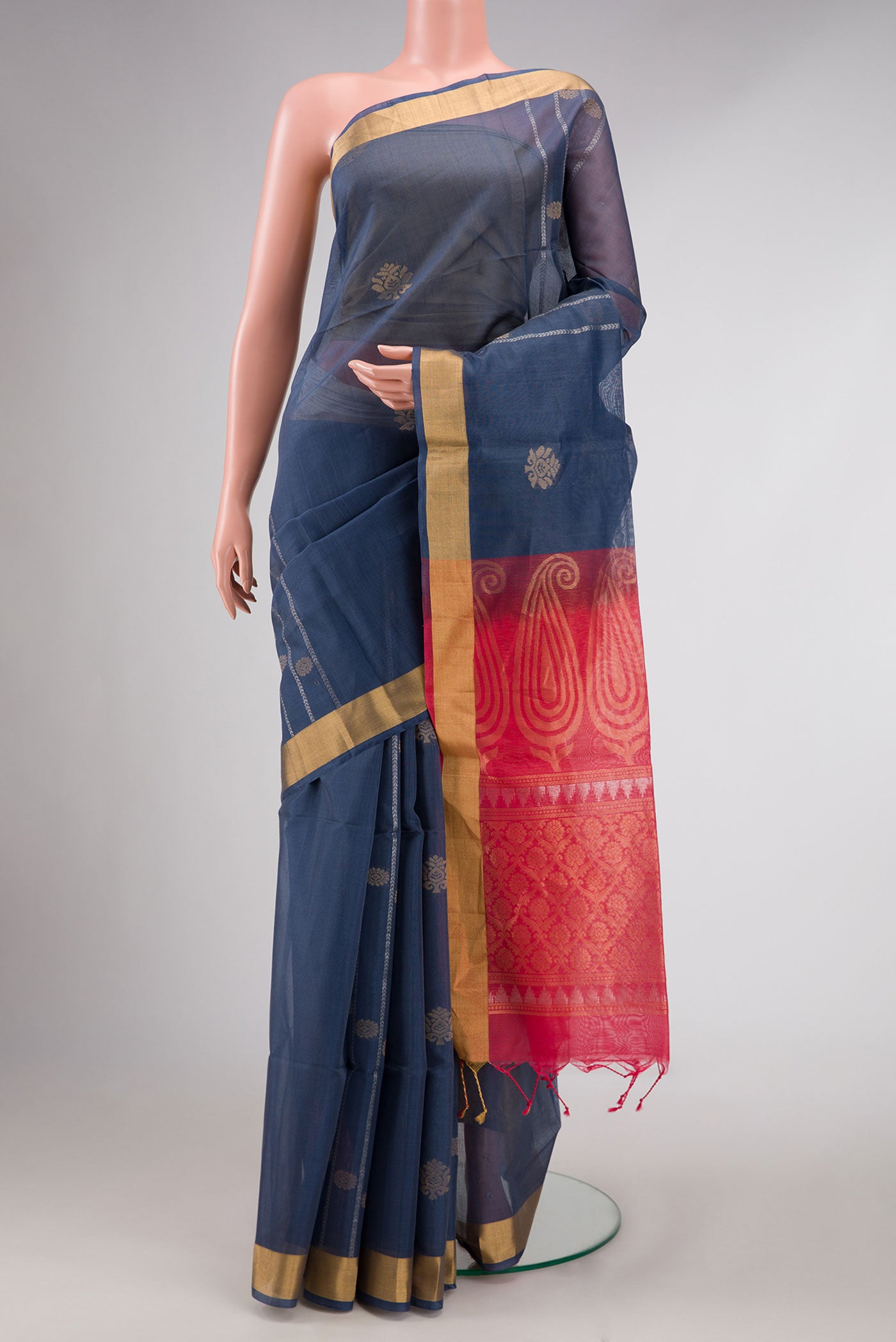 Grey Dual Tone Silk Cotton Saree with Zari Butta on the body and Zari Border displayed on a mannequin