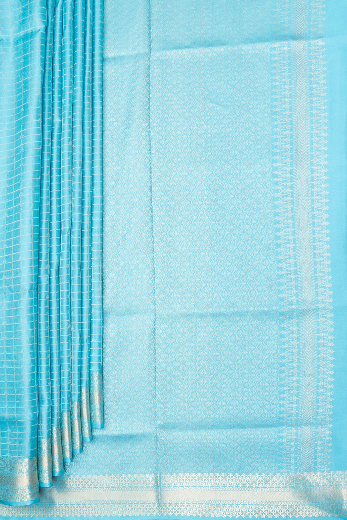 Pleats and pallu of Pure Silk Sky Blue Soft Saree with Checked design on the body and Zari Border. 