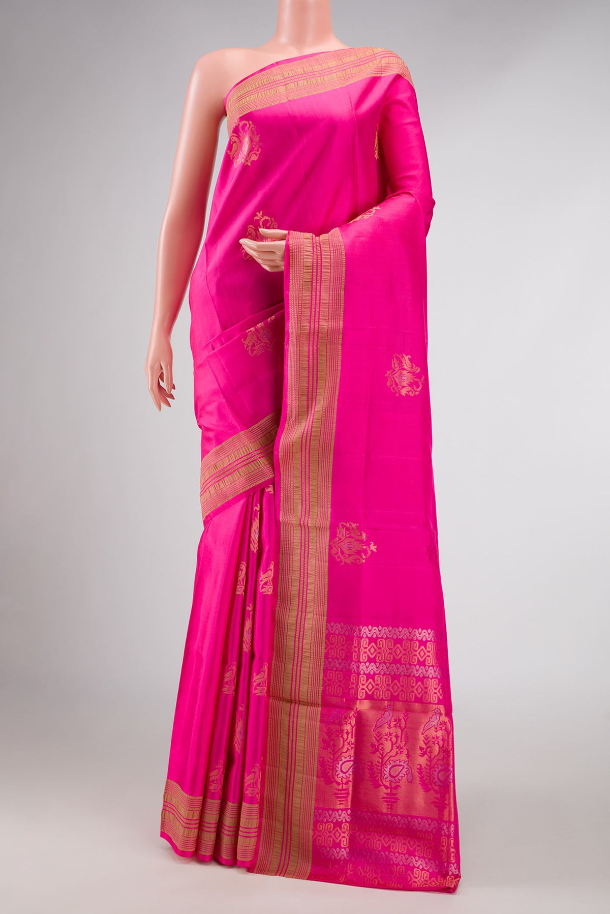 Pink Dual Tone Soft Silk Saree with Plain Body and Zari Border displayed on a mannequin