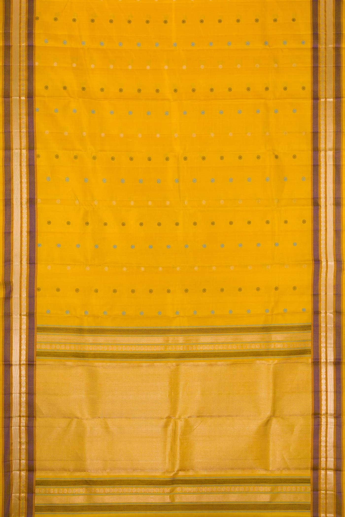 Flat view of Mustard Dual Tone Kanchipuram Silk Saree with Zari And Thread Butta on the body and Zari Border. 