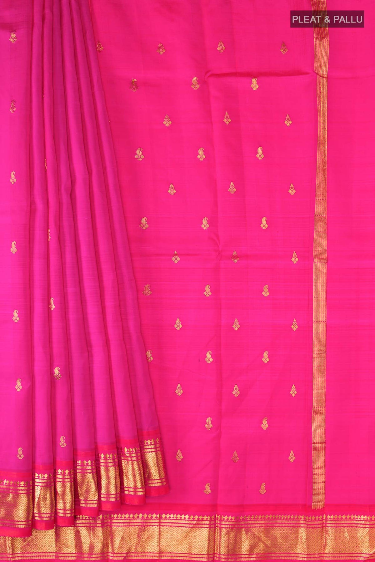 Pleats and pallu of Pink Kanchipuram Silk Saree with Zari Butta on the body and One Side Border