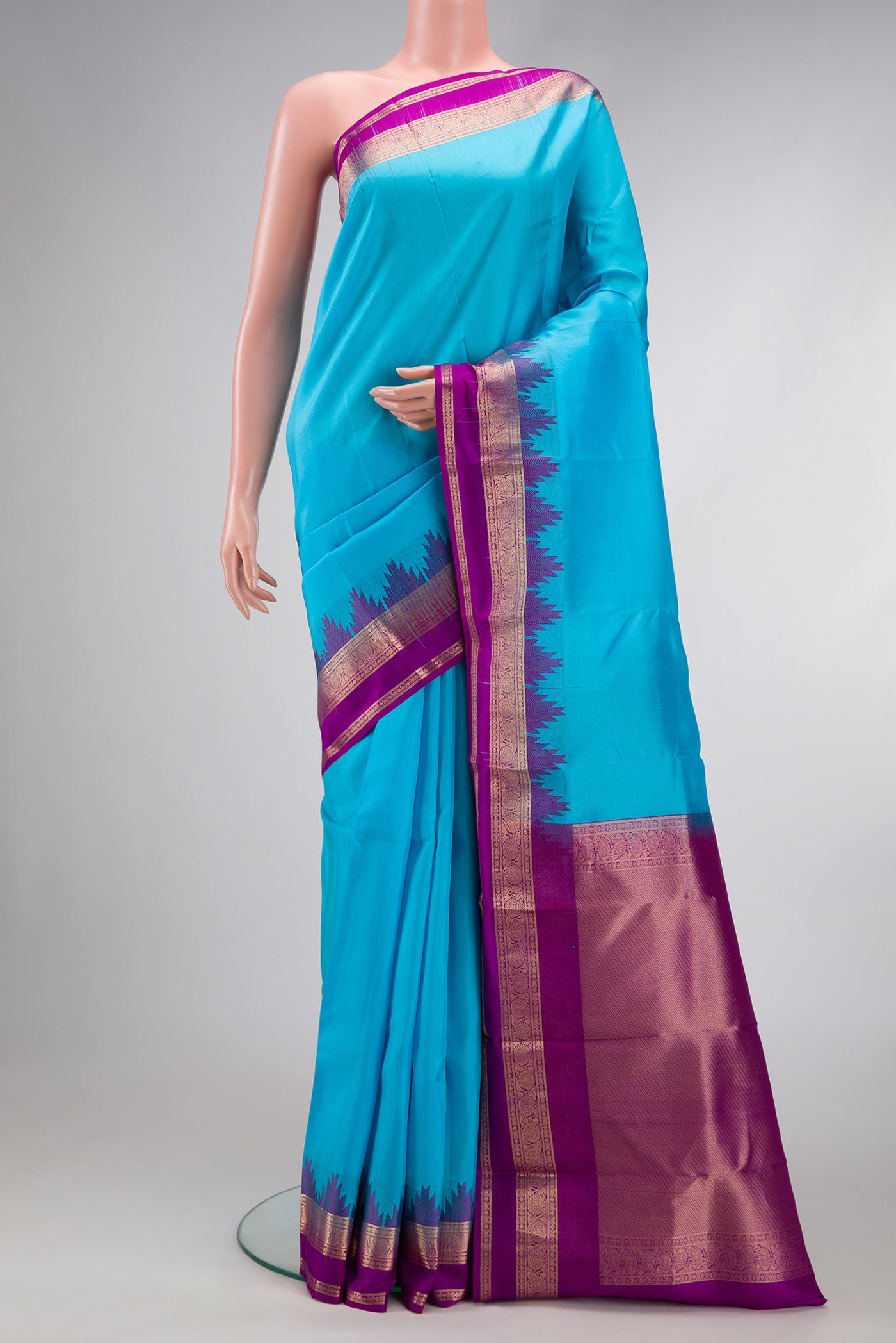 Sky Blue Dual Tone Kanchipuram Silk Saree with Plain Body and Temple Border.  displayed on a mannequin
