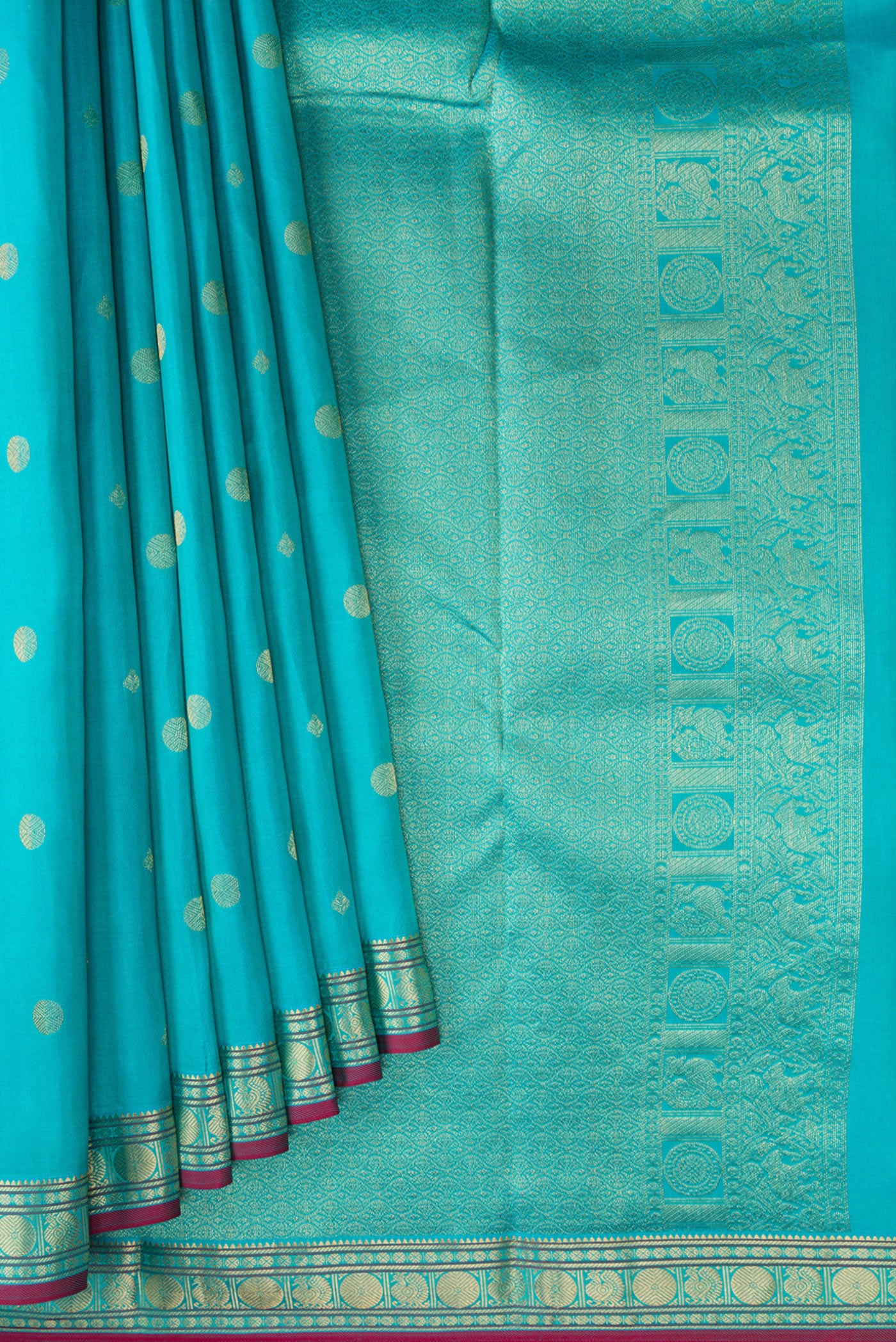 Pleats and pallu of Turquoise Kanchipuram Silk Saree with Zari Butta on the body and Zari Border. 