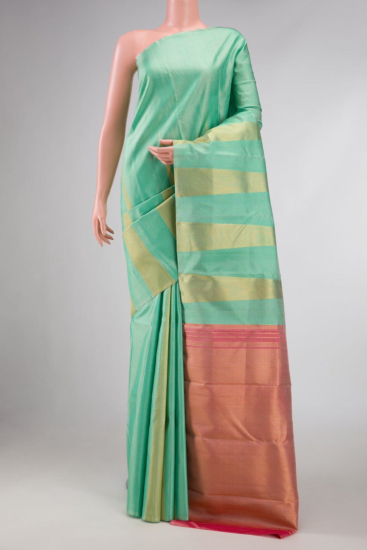Pure Silk Pure Zari Pista Green Dual Tone Kanchipuram Saree with Checked design on the body and Fancy Border displayed on a mannequin