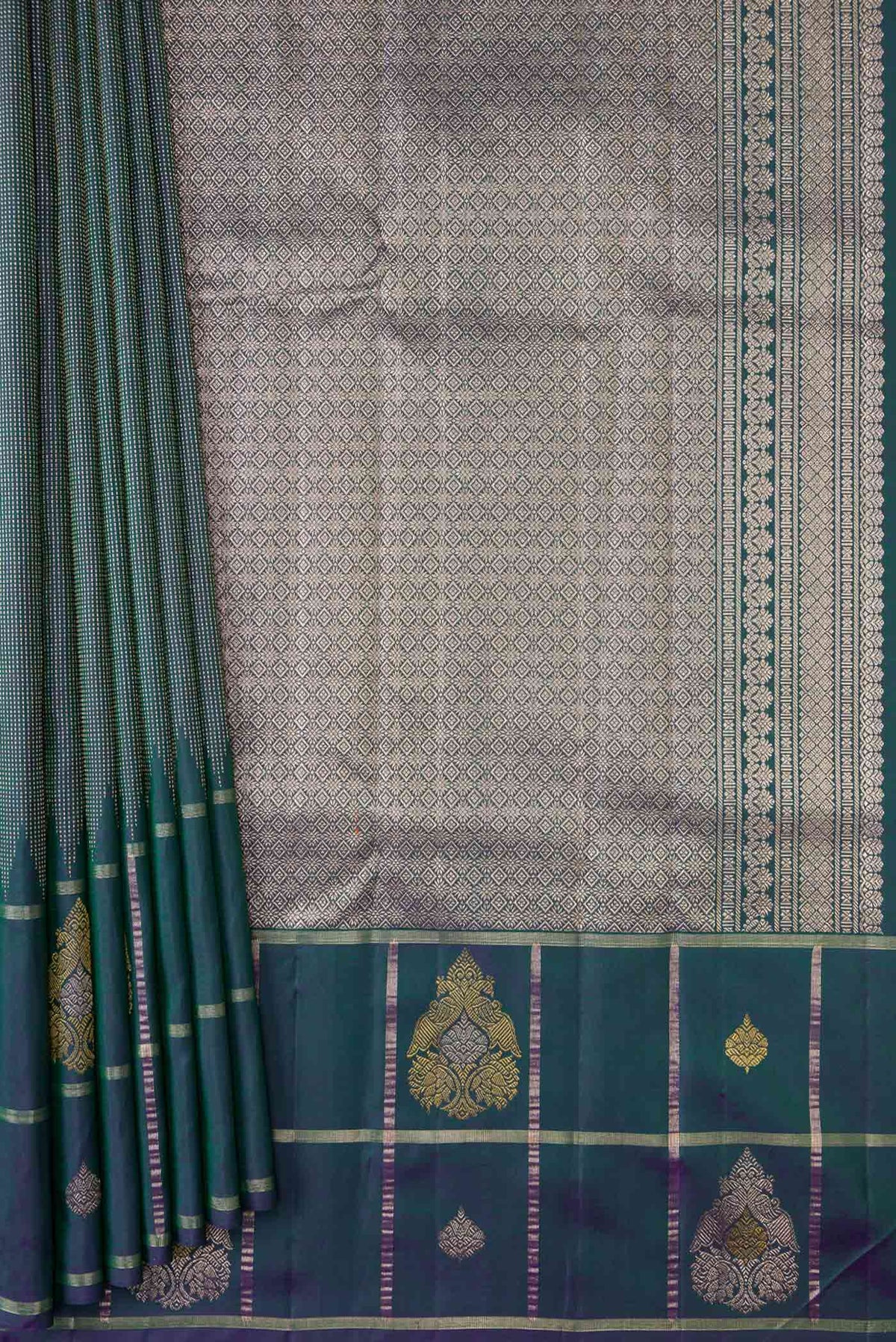 Pleats and pallu of Peacock Blue Dual Tone Kanchipuram Silk Saree with Zari Brocade on the body and Fancy Border