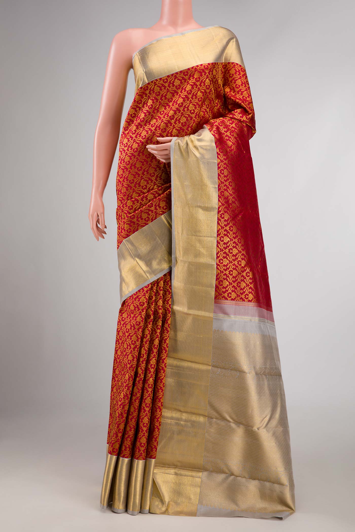 Maroon Dual Tone Kanchipuram Saree with Zari Brocade on the body and Zari Border displayed on a mannequin