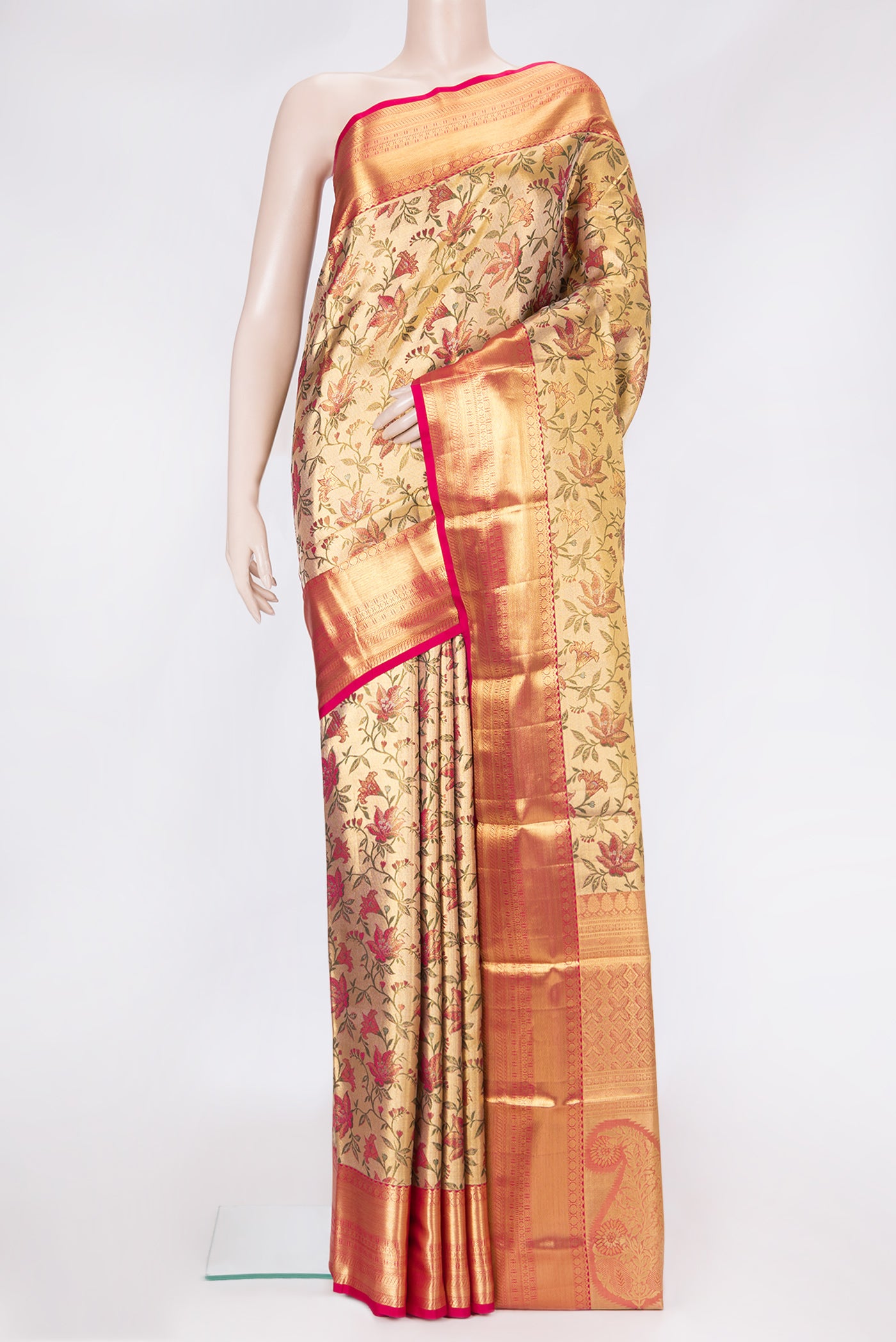 Gold Dual Tone Kanchipuram Tissue Silk Saree with Zari Brocade on the body and Zari Border.  displayed on a mannequin