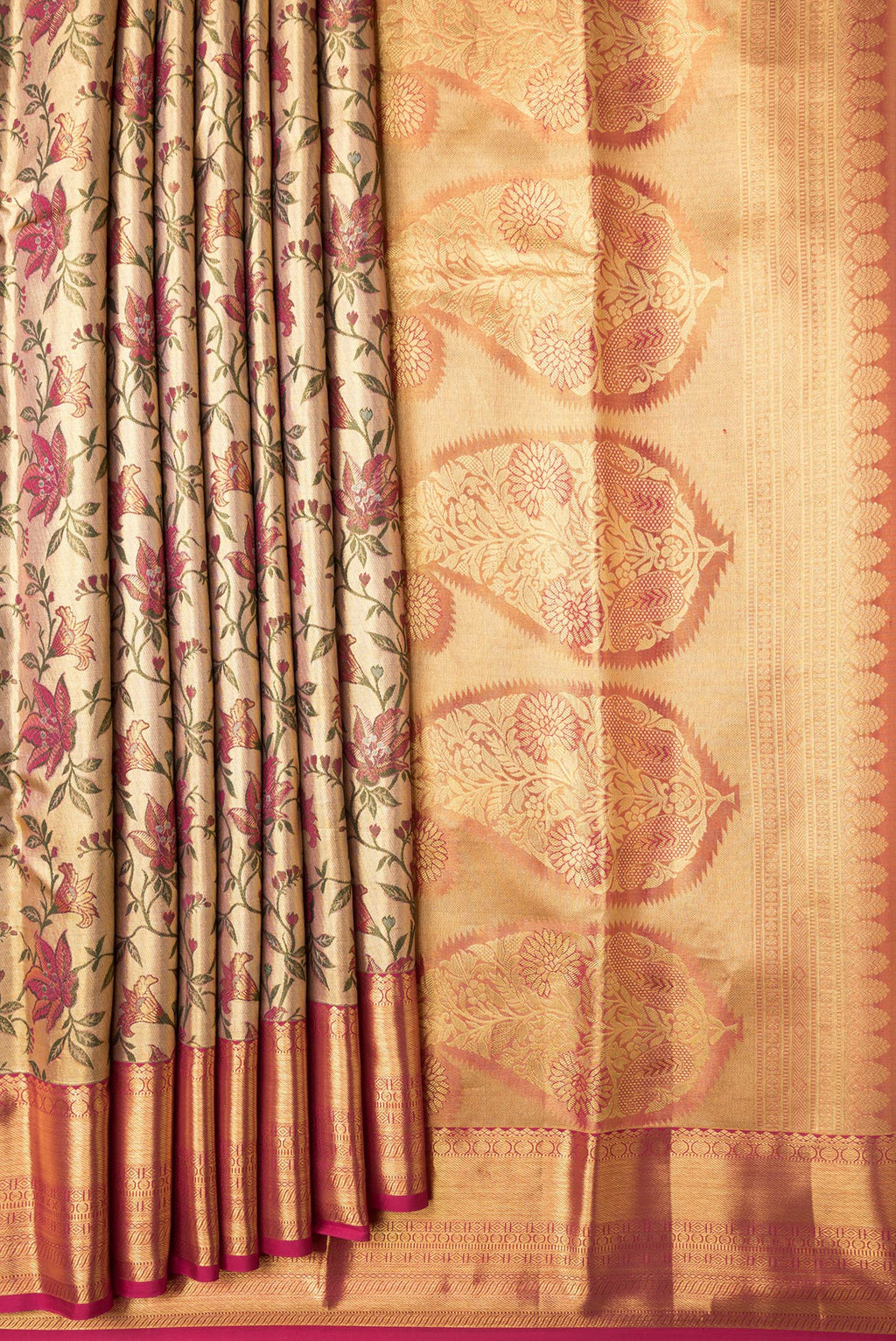 Pleats and pallu of Gold Dual Tone Kanchipuram Tissue Silk Saree with Zari Brocade on the body and Zari Border. 