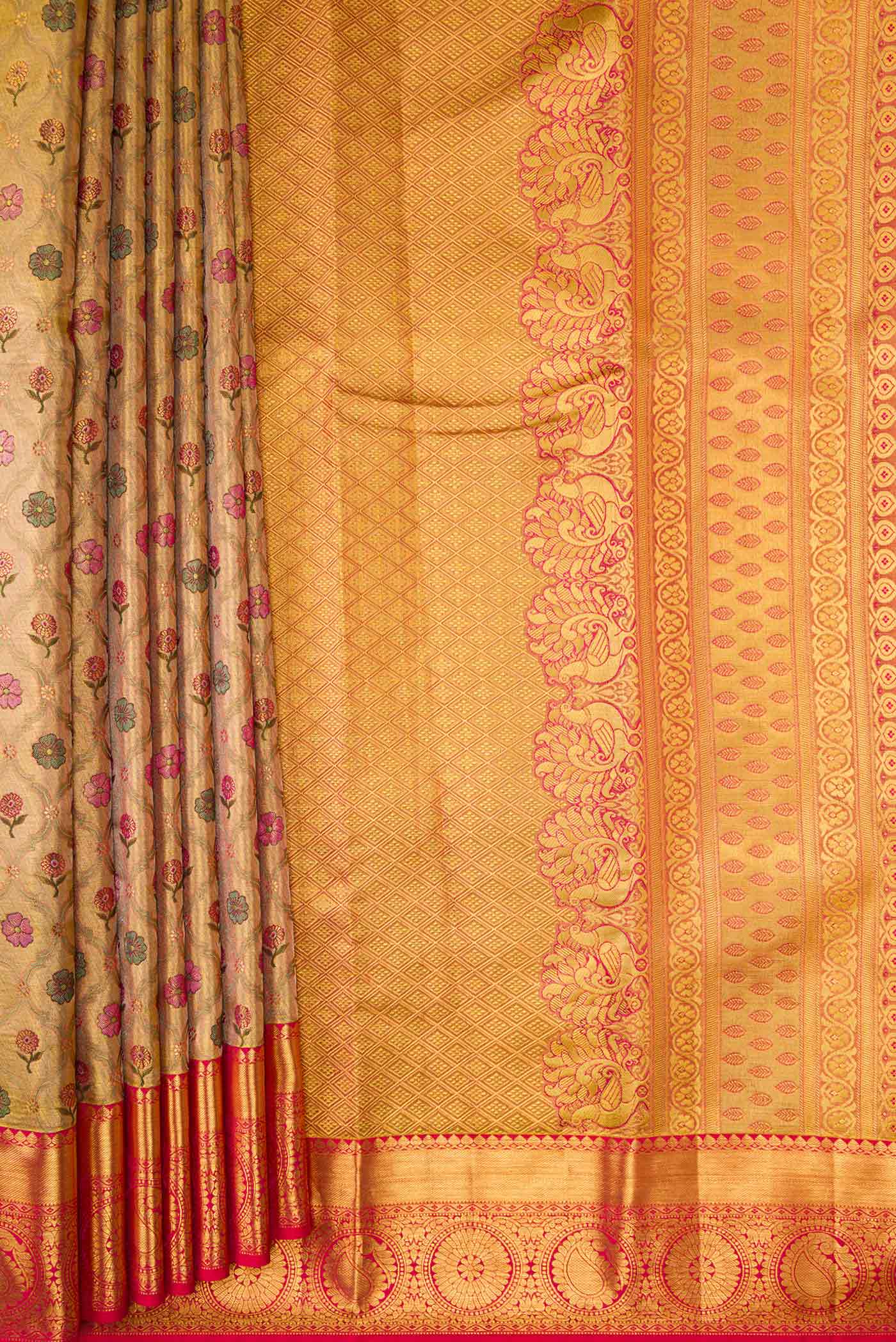 Pleats and pallu of Gold Dual Tone Kanchipuram Tissue Silk Saree with Zari Brocade on the body and Zari Border. 