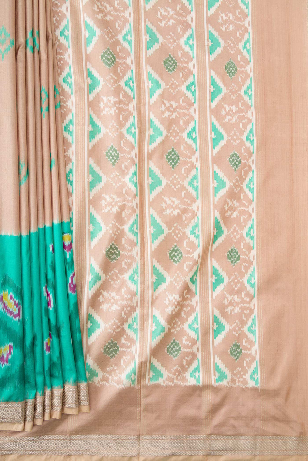 Pleats and pallu of Brown Dual Tone Double Ikat Saree with Ikat Print on the body and Ikat Border