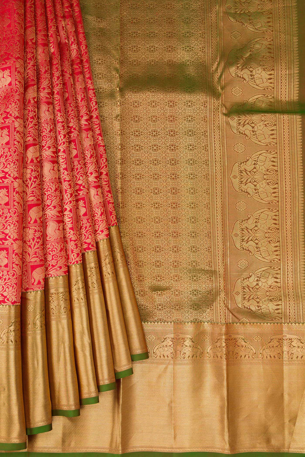Pleats and pallu of Red Kanchipuram Silk Saree with Zari Brocade on the body and Zari Border. 