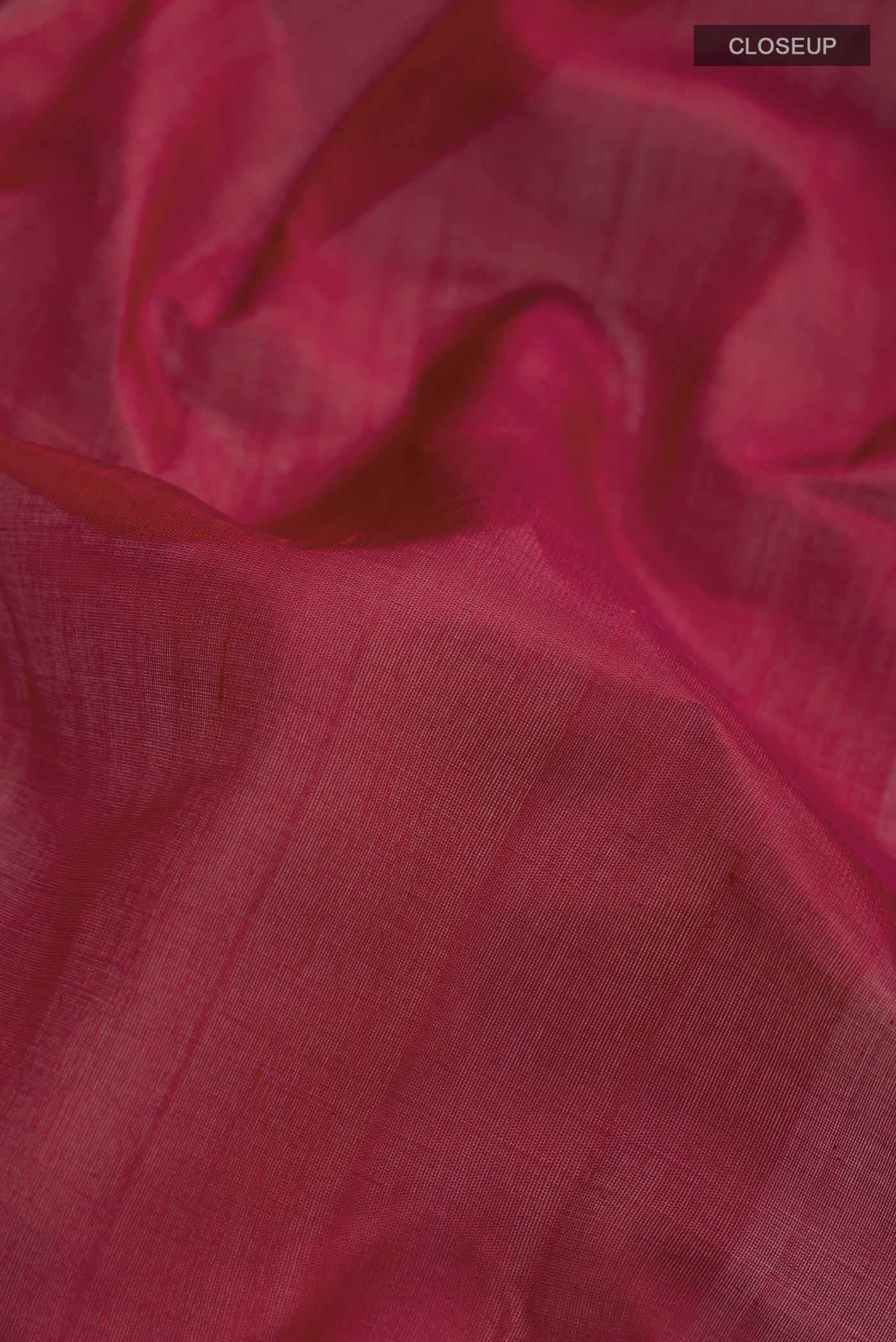 Close up of Maroon Kanchi Cotton Saree with Plain Body and Plain Border displaying folds