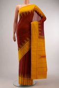 Maroon Kanchi Cotton Saree with Plain Body and Plain Border displayed on a mannequin