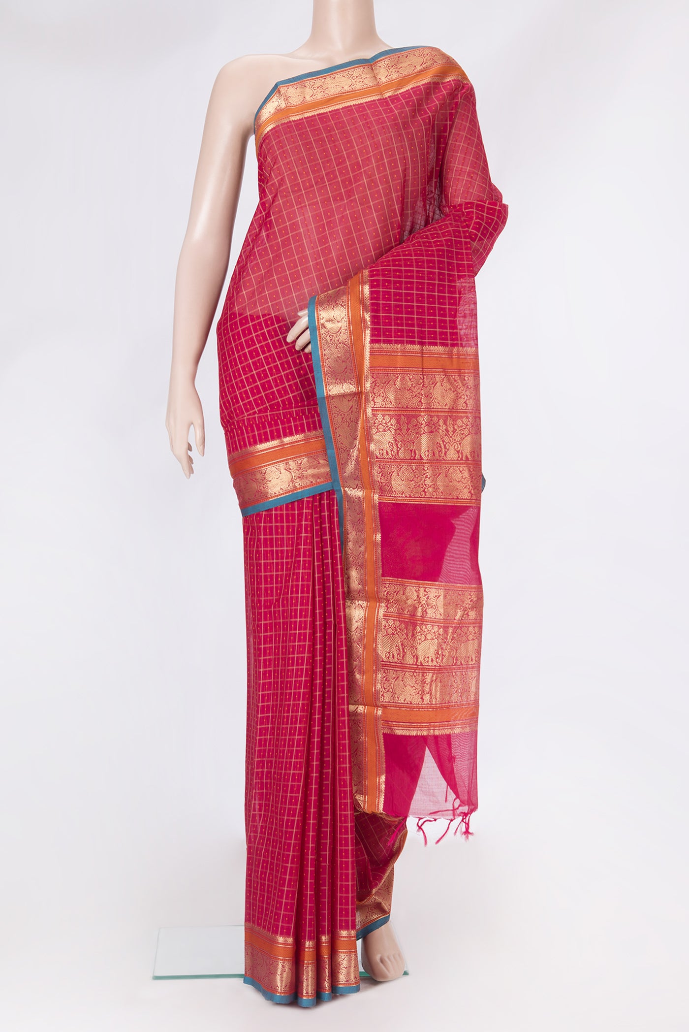Pink Kanchi Cotton Saree with Checked design on the body and Zari Border.  displayed on a mannequin