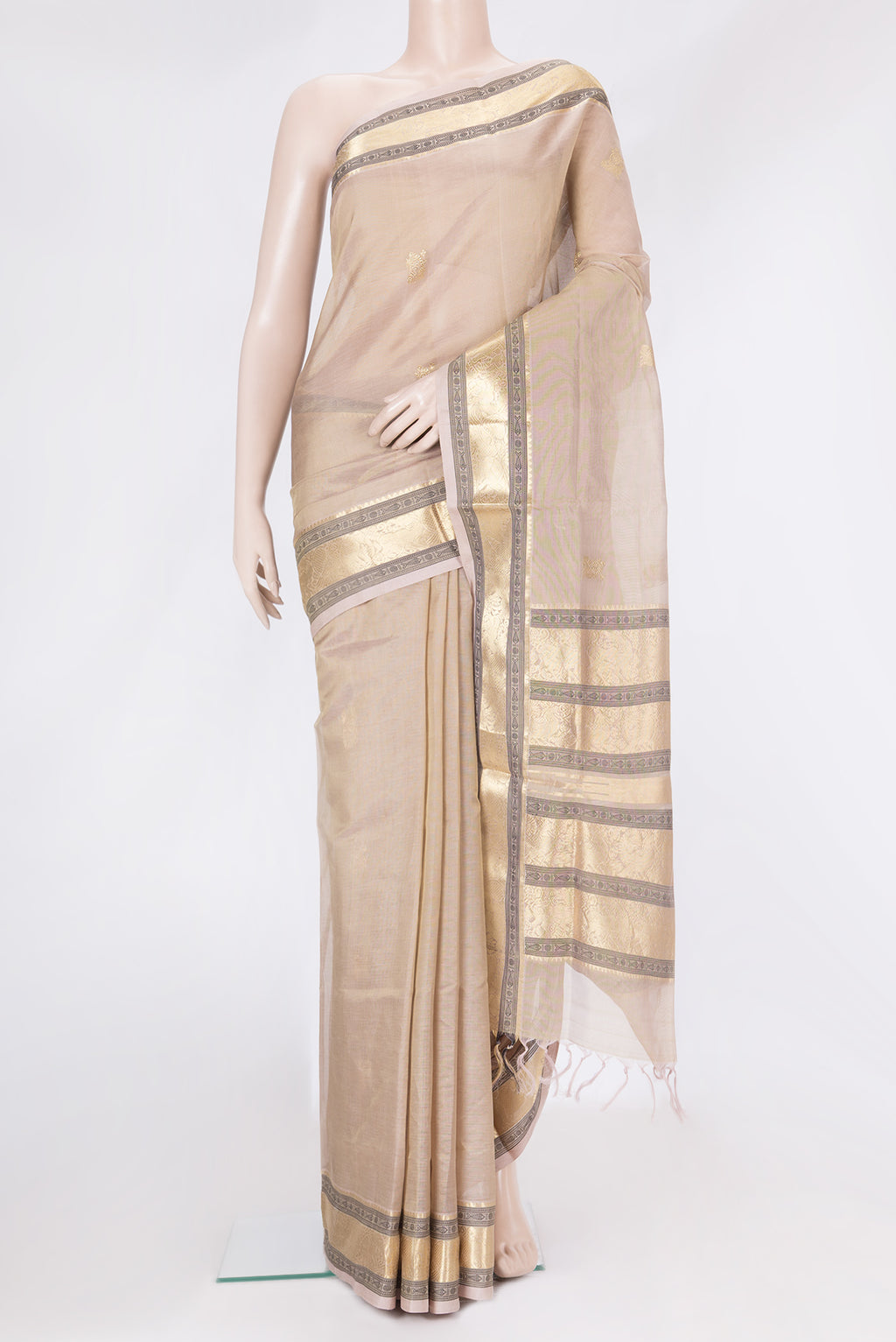 Rose Gold Dual Tone Silk Cotton Saree with Zari Butta on the body and Zari And Thread Border.  displayed on a mannequin