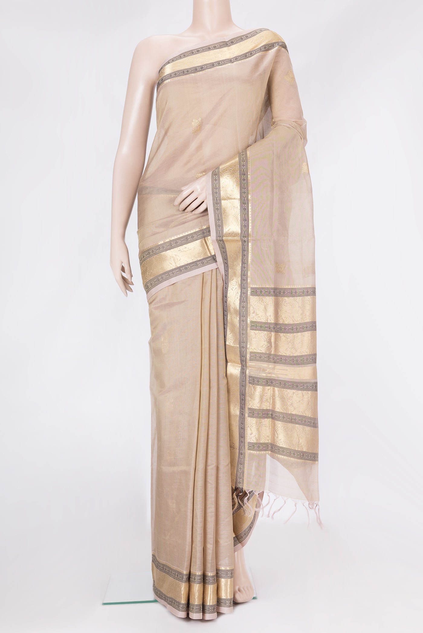 Rose Gold Dual Tone Silk Cotton Saree with Zari Butta on the body and Zari And Thread Border.  displayed on a mannequin