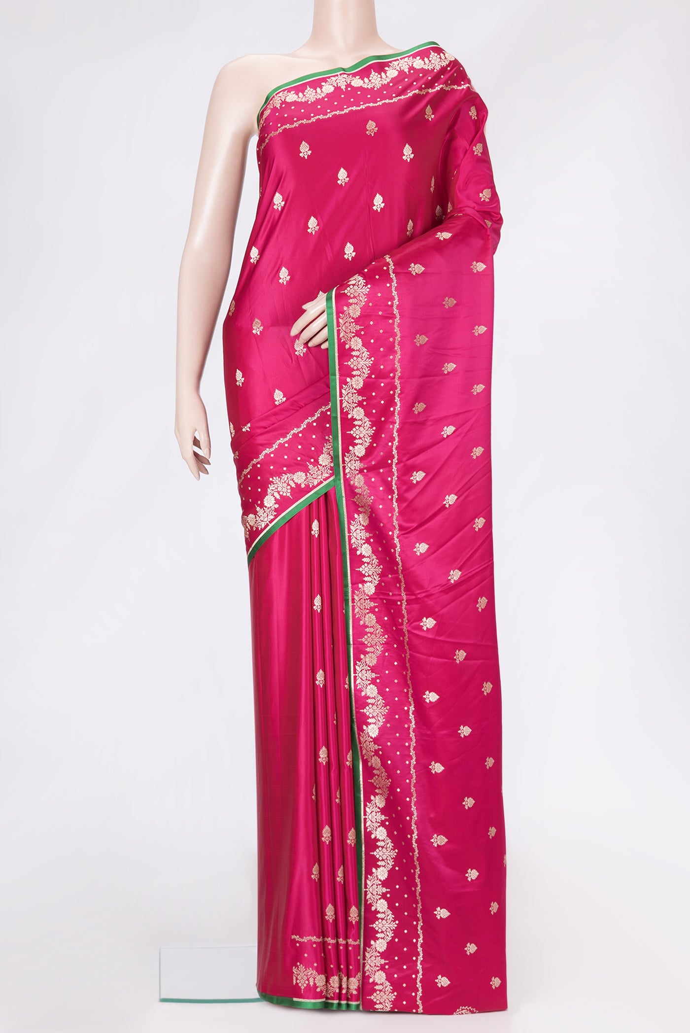Pink Dual Tone Banarasi Silk Saree with Zari Butta on the body and Fancy Border.  displayed on a mannequin