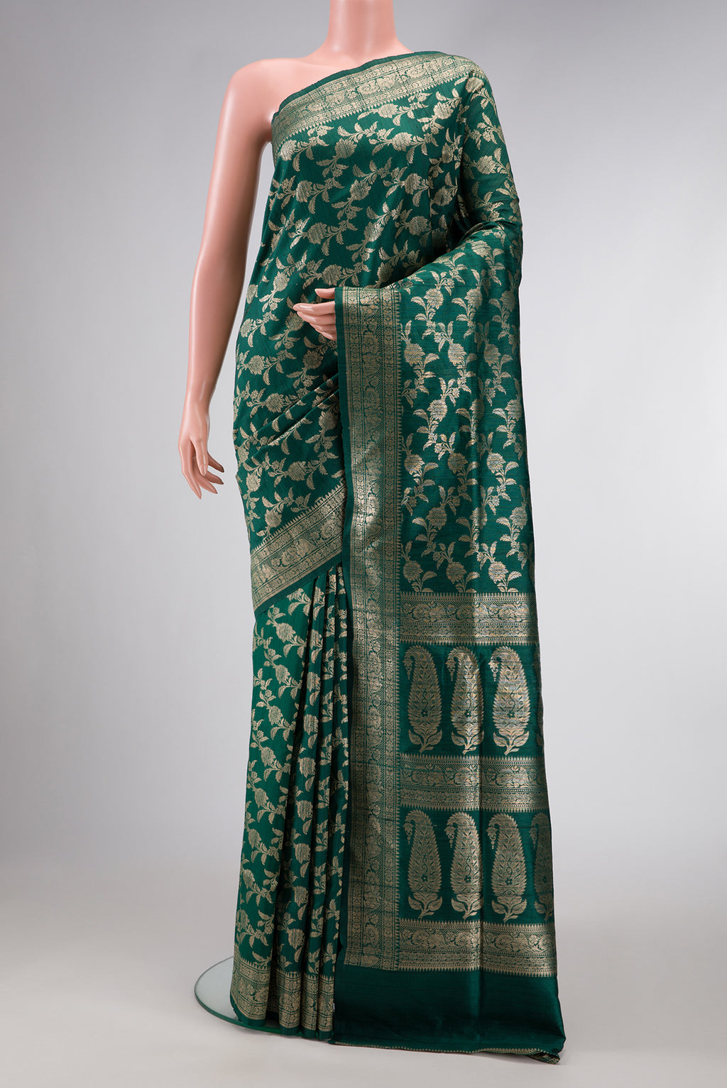 Bottle Green Dual Tone Banarasi Silk Saree with Zari Brocade on the body and Zari Border.  displayed on a mannequin