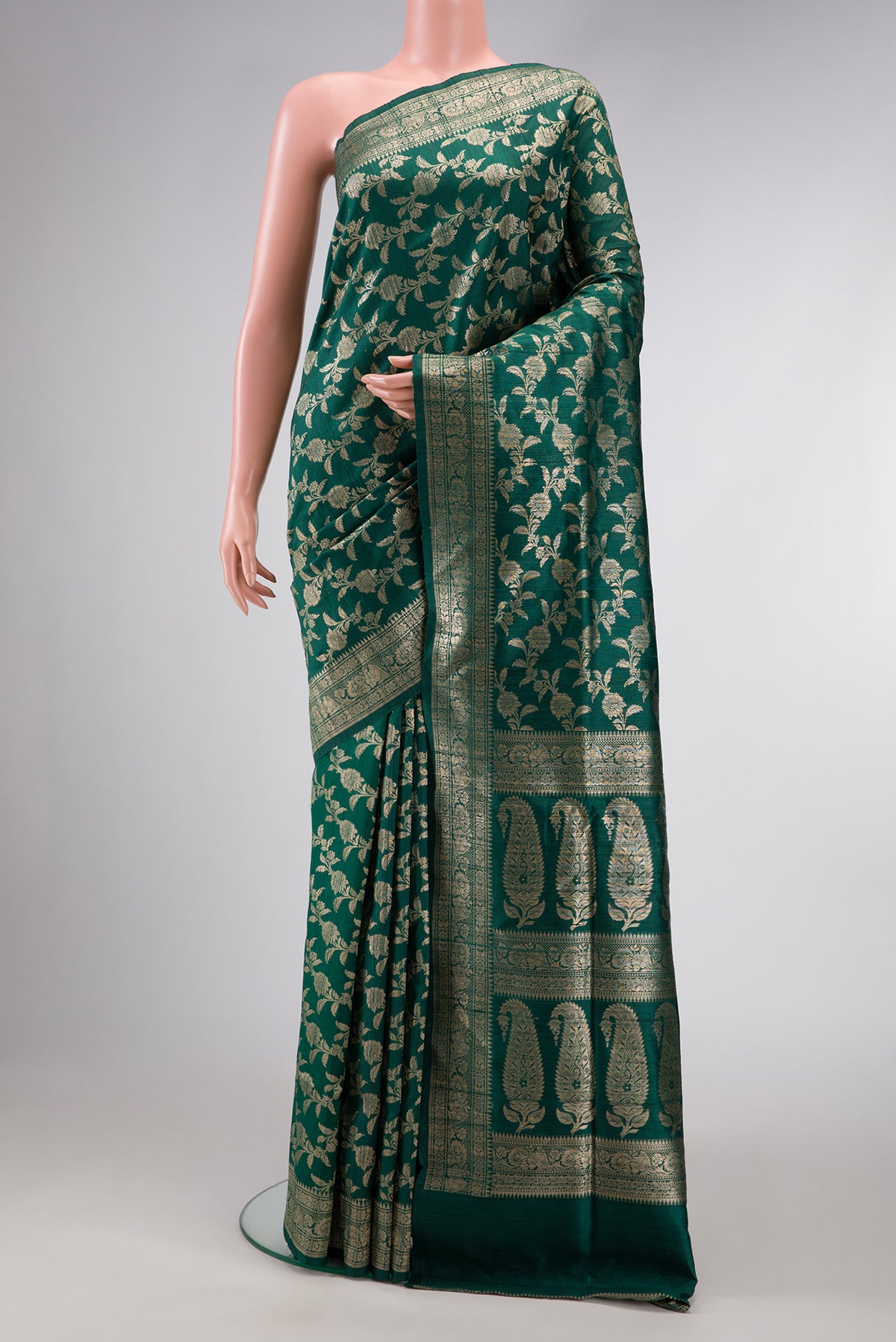Bottle Green Dual Tone Banarasi Silk Saree with Zari Brocade on the body and Zari Border.  displayed on a mannequin