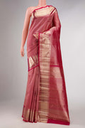 Pink Dual Tone Kanchipuram Silk Saree with Zari Brocade on the body and Zari Border displayed on a mannequin