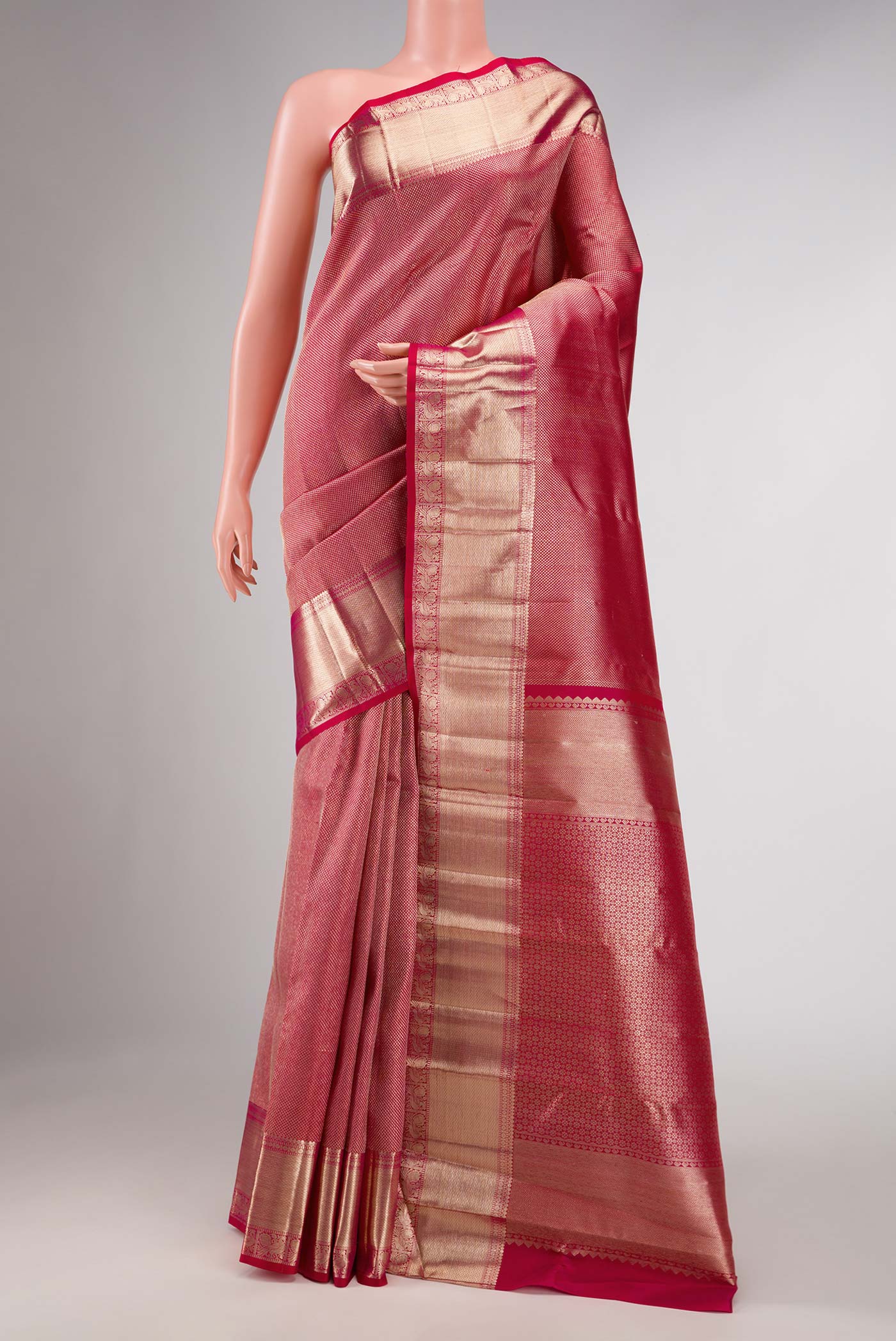 Pink Dual Tone Kanchipuram Silk Saree with Zari Brocade on the body and Zari Border displayed on a mannequin