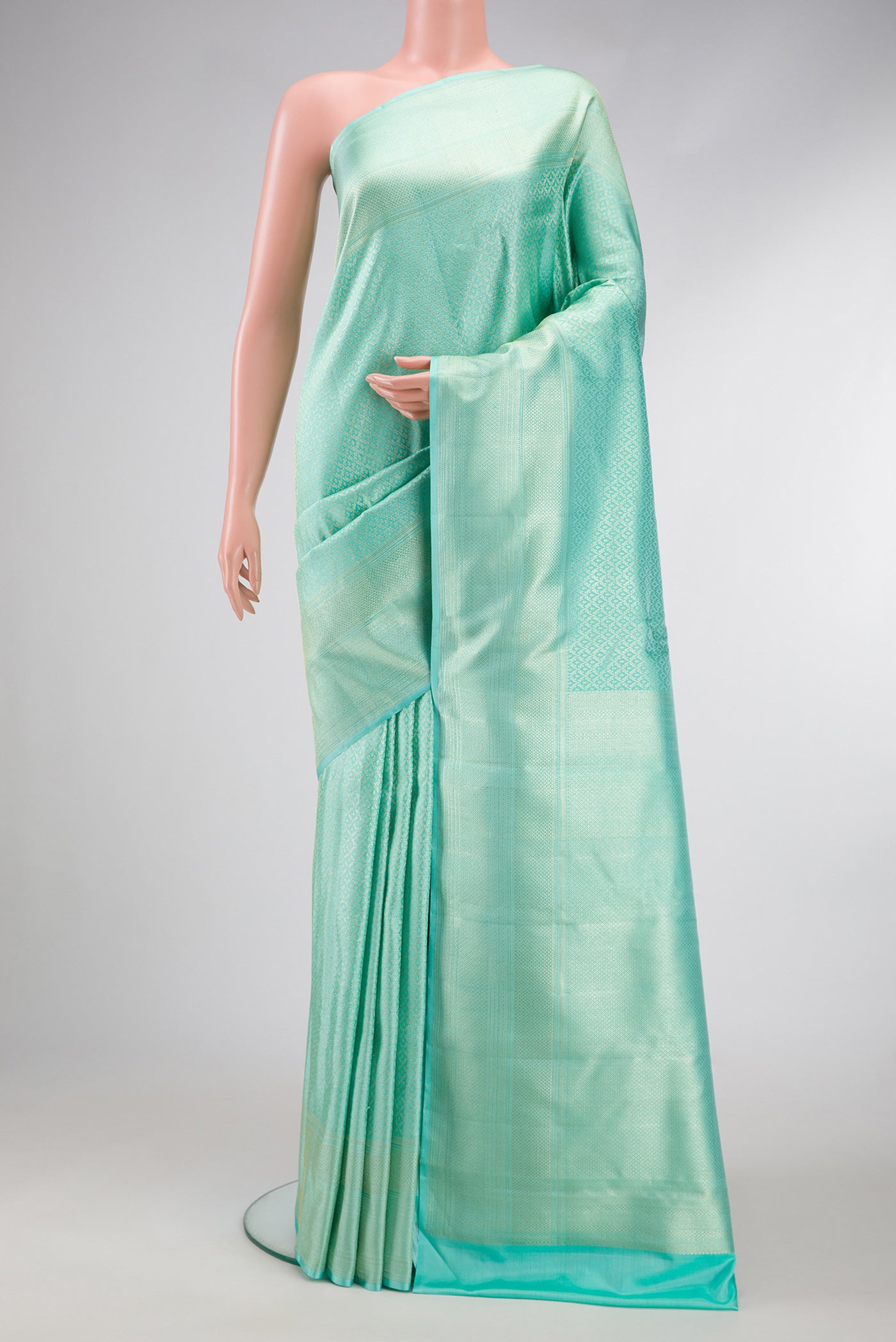 Light Blue Dual Tone Kanchipuram Silk Saree with Zari Brocade on the body and Zari Border.  displayed on a mannequin