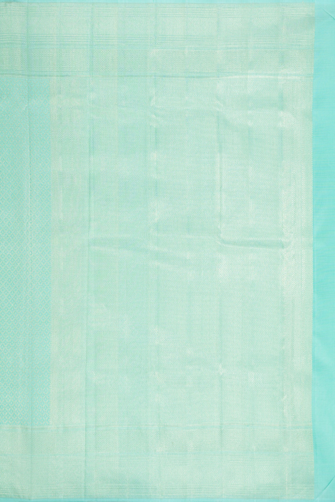 Close up image of the pallu of Light Blue Dual Tone Kanchipuram Silk Saree with Zari Brocade on the body and Zari Border. 