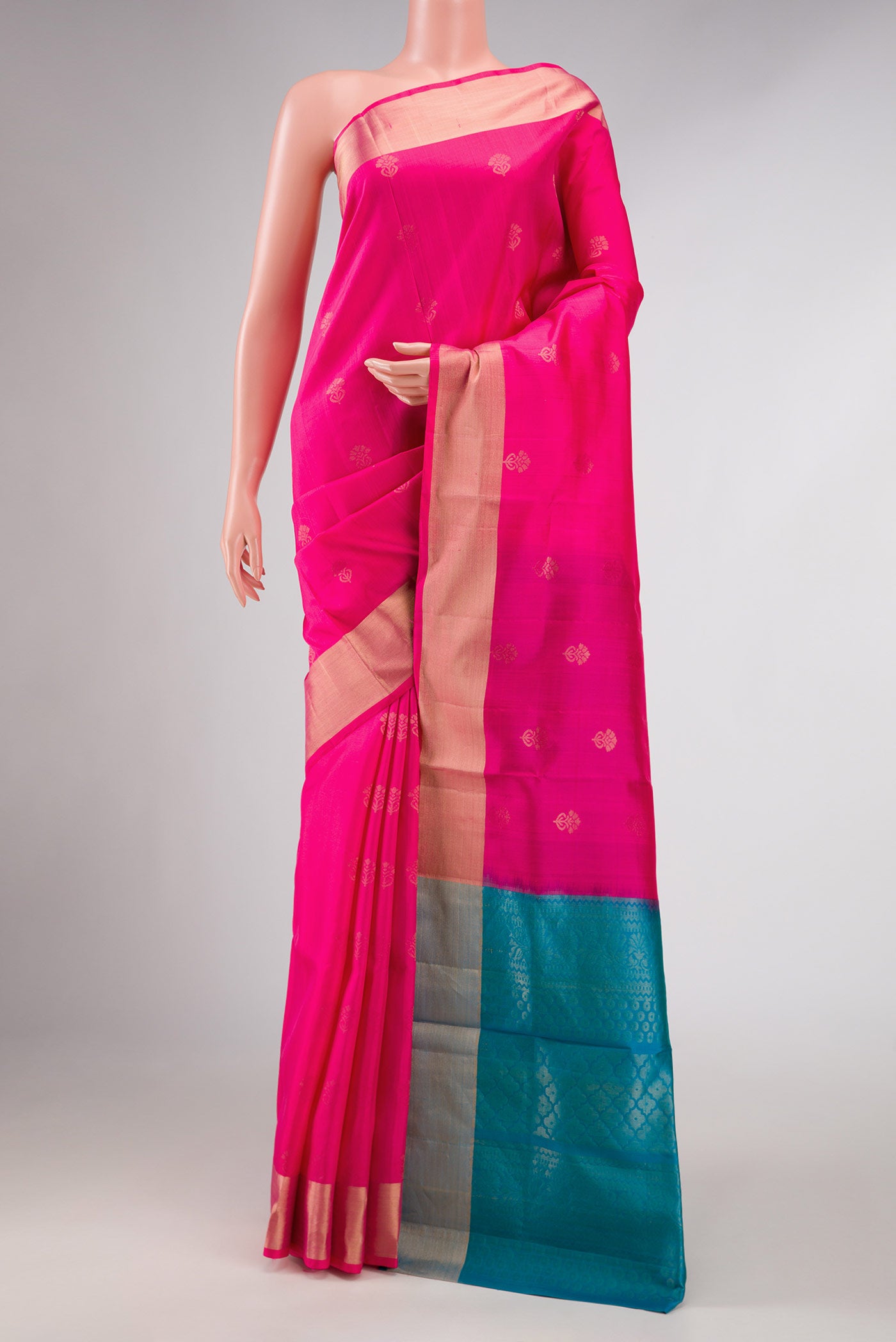 Pink Dual Tone Soft Silk Saree with Zari Butta on the body and Zari Border displayed on a mannequin