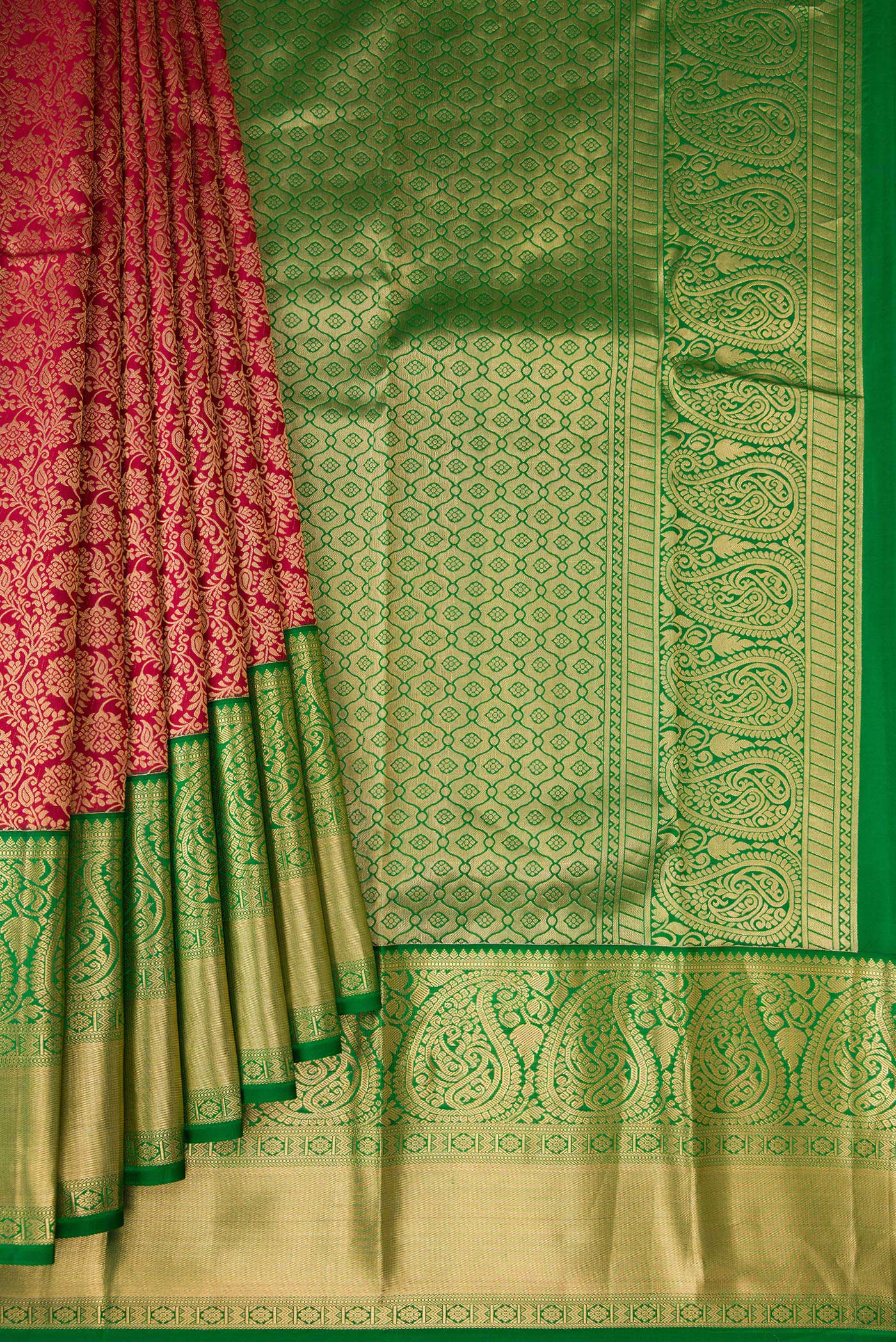 Pleats and pallu of Maroon Kanchipuram Silk Saree with Zari Brocade on the body and Zari Border. 