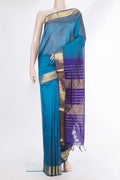 Peacock Blue Silk Cotton Saree with Plain Body and Zari Border.  displayed on a mannequin