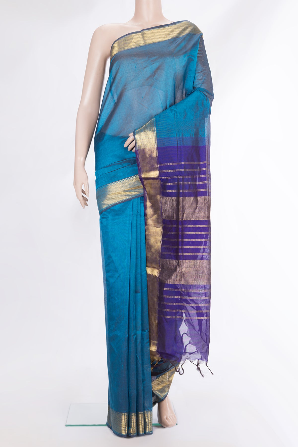 Peacock Blue Silk Cotton Saree with Plain Body and Zari Border.  displayed on a mannequin