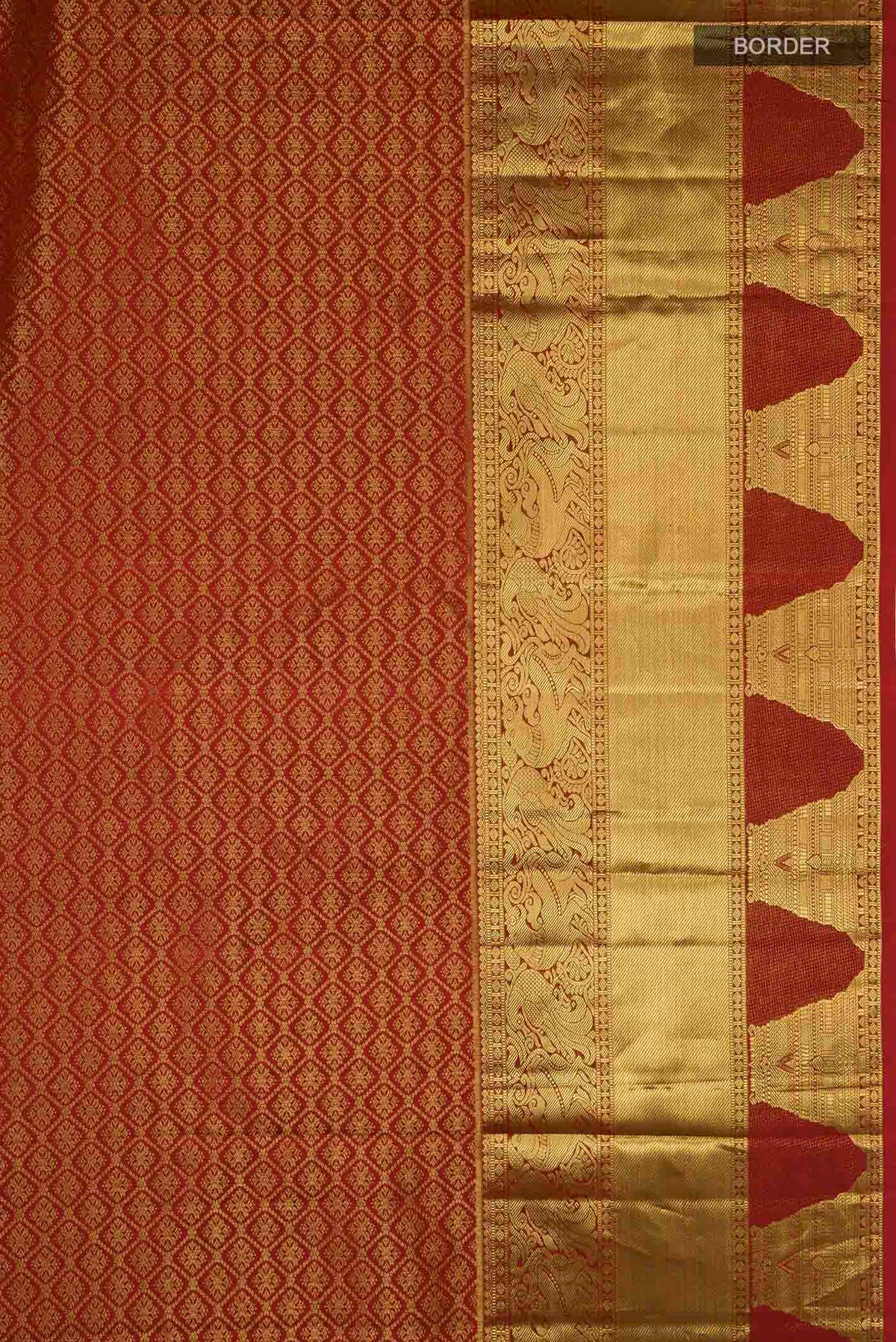 Border image of Maroon Kanchipuram Silk Saree with Zari Butta on the body and Zari Border