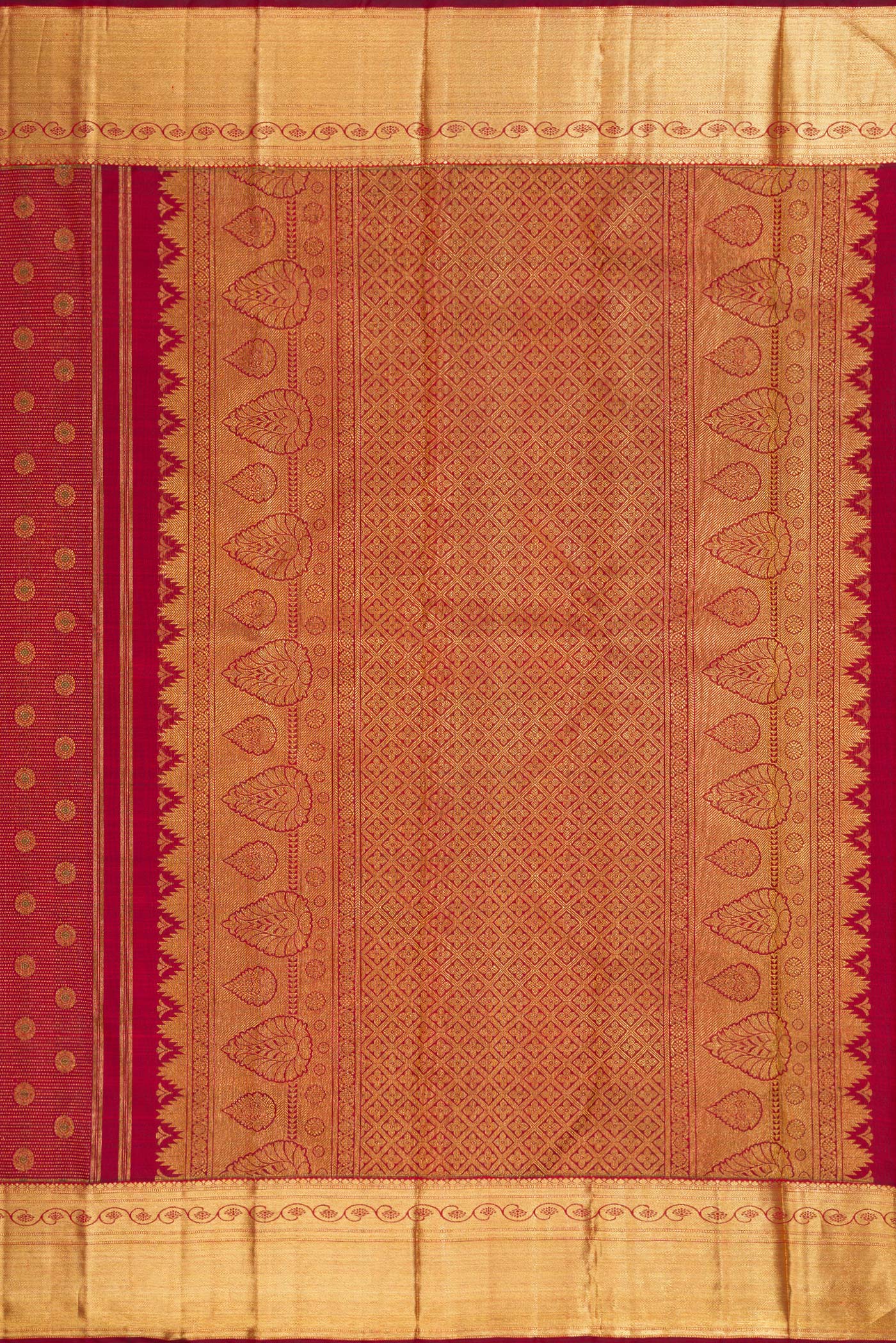 Close up image of the pallu of Maroon Dual Tone Kanchipuram Silk Saree with Zari Brocade on the body and Zari Border. 