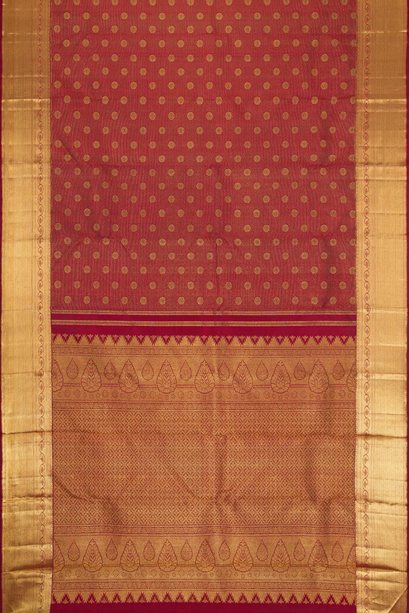 Flat view of Maroon Dual Tone Kanchipuram Silk Saree with Zari Brocade on the body and Zari Border. 