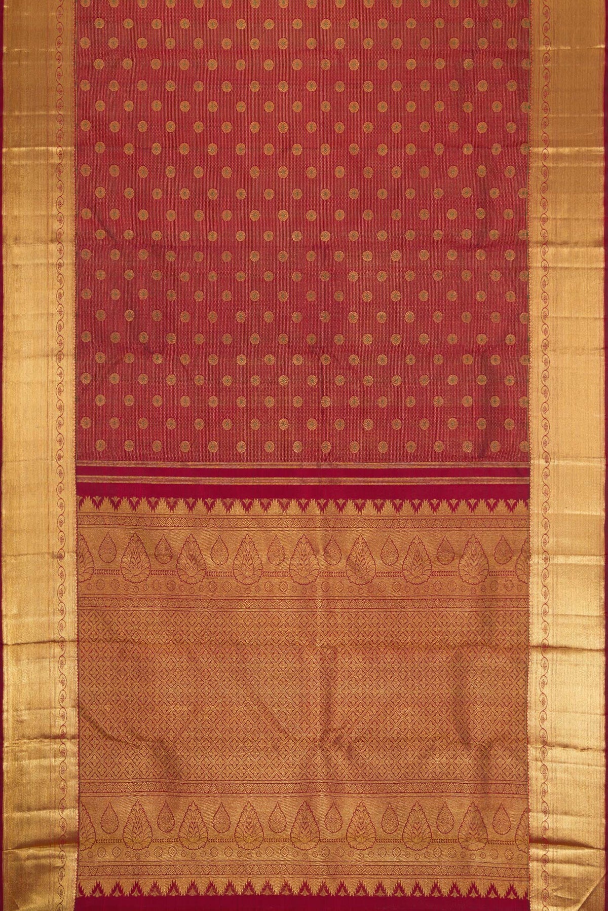Flat view of Maroon Dual Tone Kanchipuram Silk Saree with Zari Brocade on the body and Zari Border. 