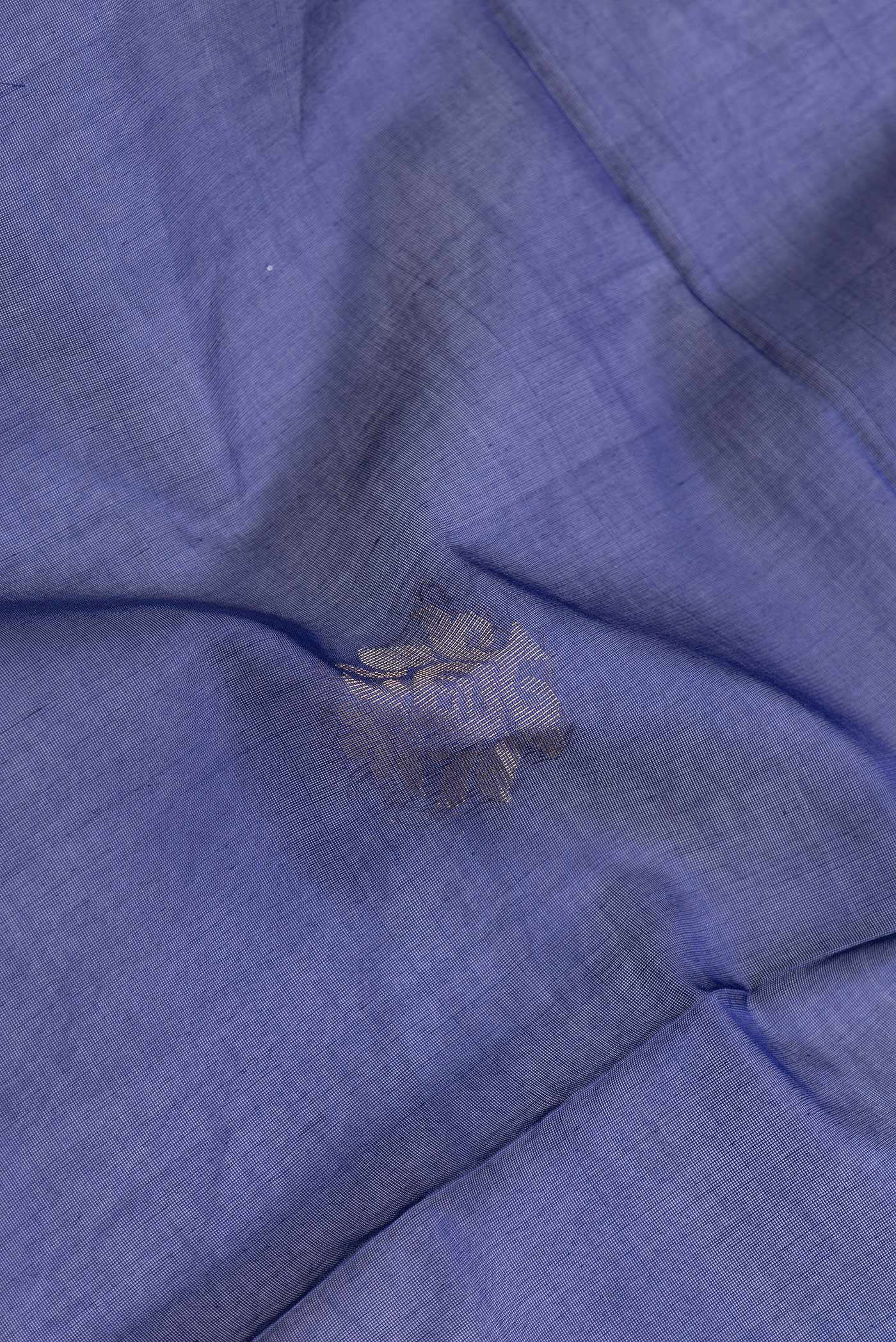 Close up of Navy Blue Dual Tone Silk Cotton Saree with Zari Butta on the body and Zari Border.  displaying folds