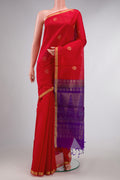 Red Dual Tone Silk Cotton Saree with Zari Butta on the body and Zari Border displayed on a mannequin
