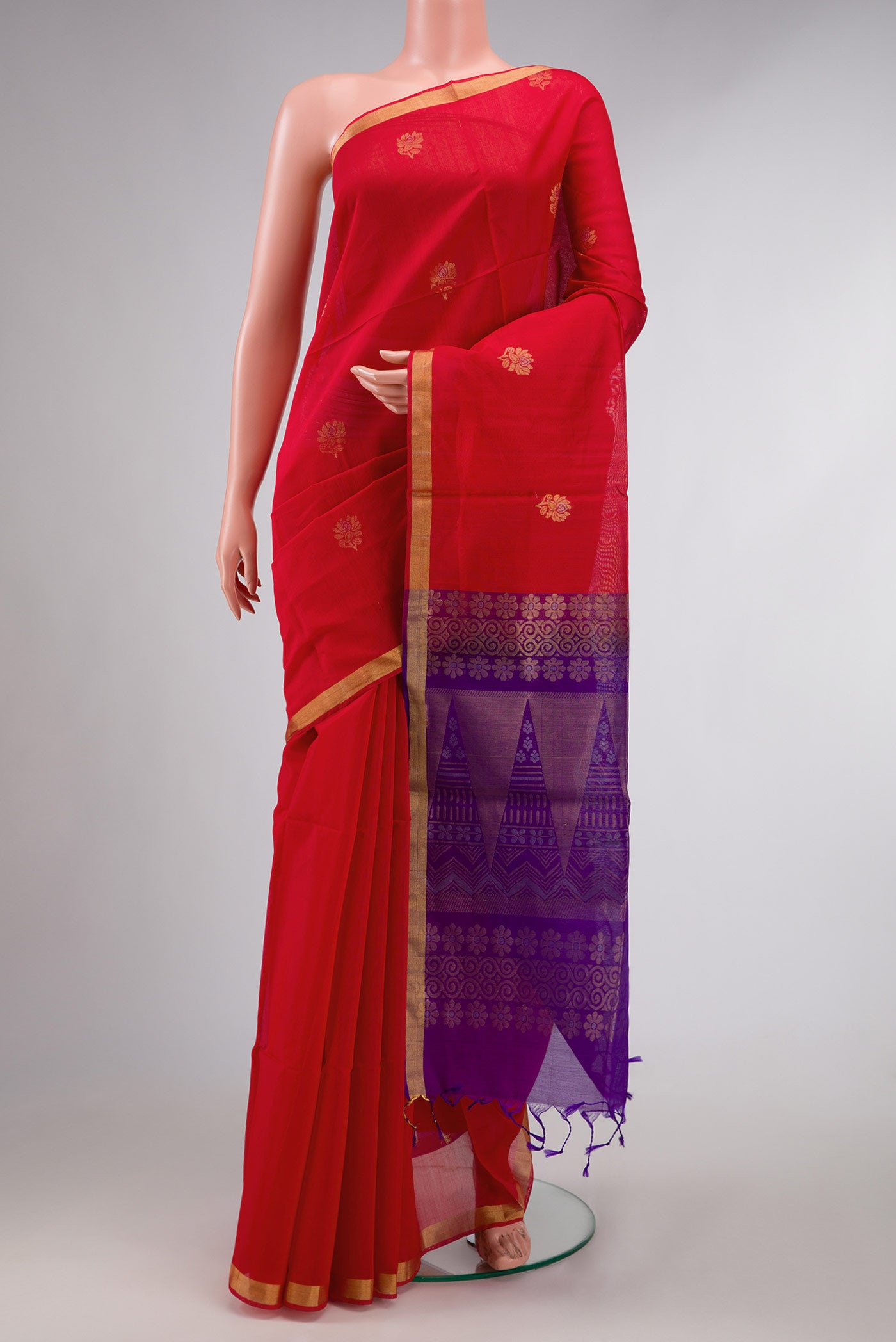 Red Dual Tone Silk Cotton Saree with Zari Butta on the body and Zari Border displayed on a mannequin