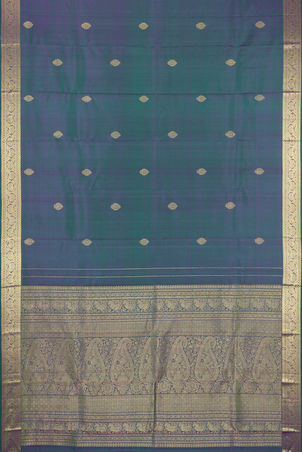 Flat view of Peacock Blue Dual Tone Kanchipuram Silk Saree with Zari Butta on the body and Zari Border. 