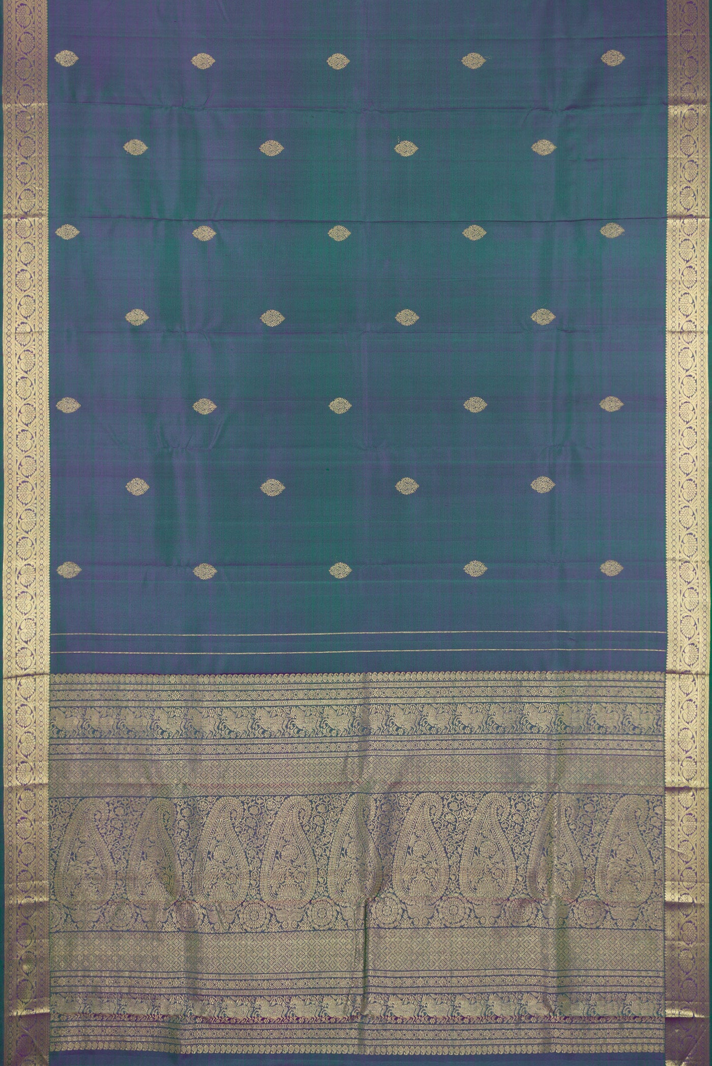 Flat view of Peacock Blue Dual Tone Kanchipuram Silk Saree with Zari Butta on the body and Zari Border. 