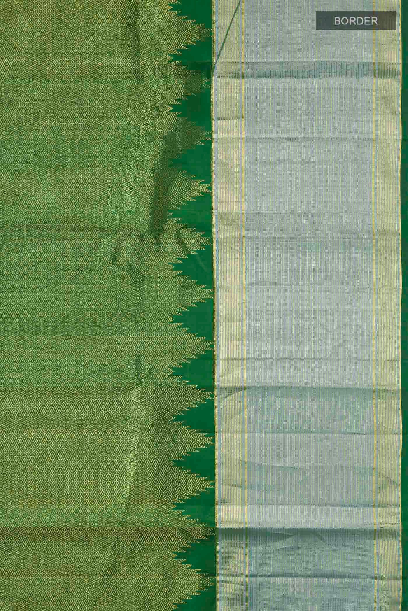 Border image of Green Kanchipuram Silk Saree with Zari Brocade on the body and Zari Border