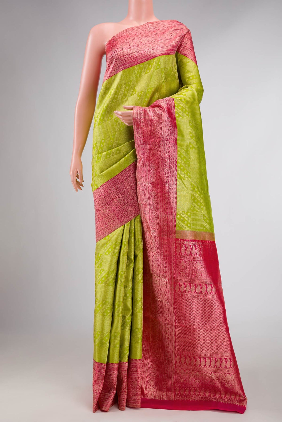 Parrot Green Dual Tone Kanchipuram Silk Saree with Zari Brocade on the body and Zari Border displayed on a mannequin