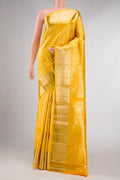 Yellow Dual Tone Kanchipuram Silk Saree with Zari Brocade on the body and Zari Border displayed on a mannequin