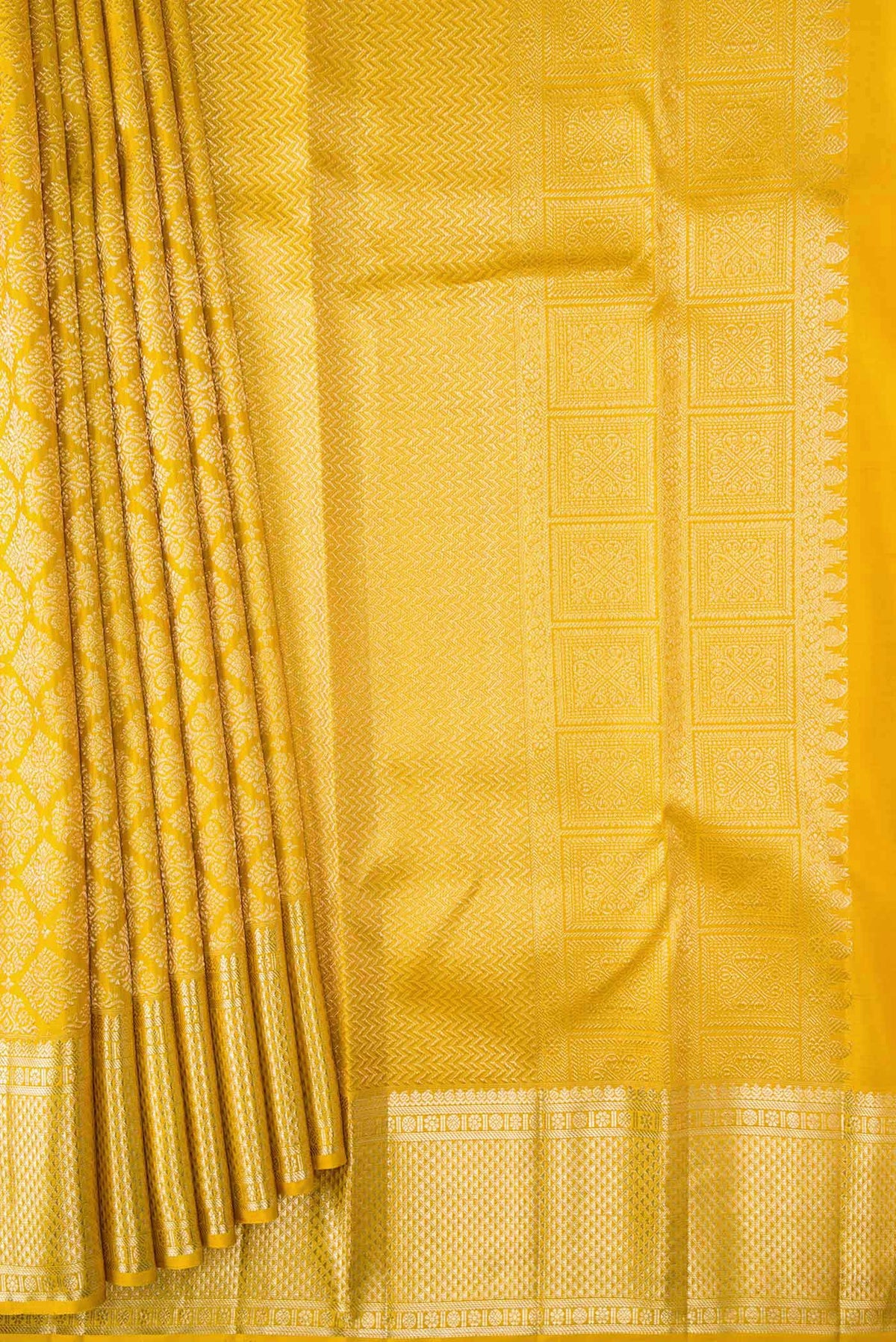 Pleats and pallu of Mustard Dual Tone Kanchipuram Silk Saree with Zari Brocade on the body and Zari Border