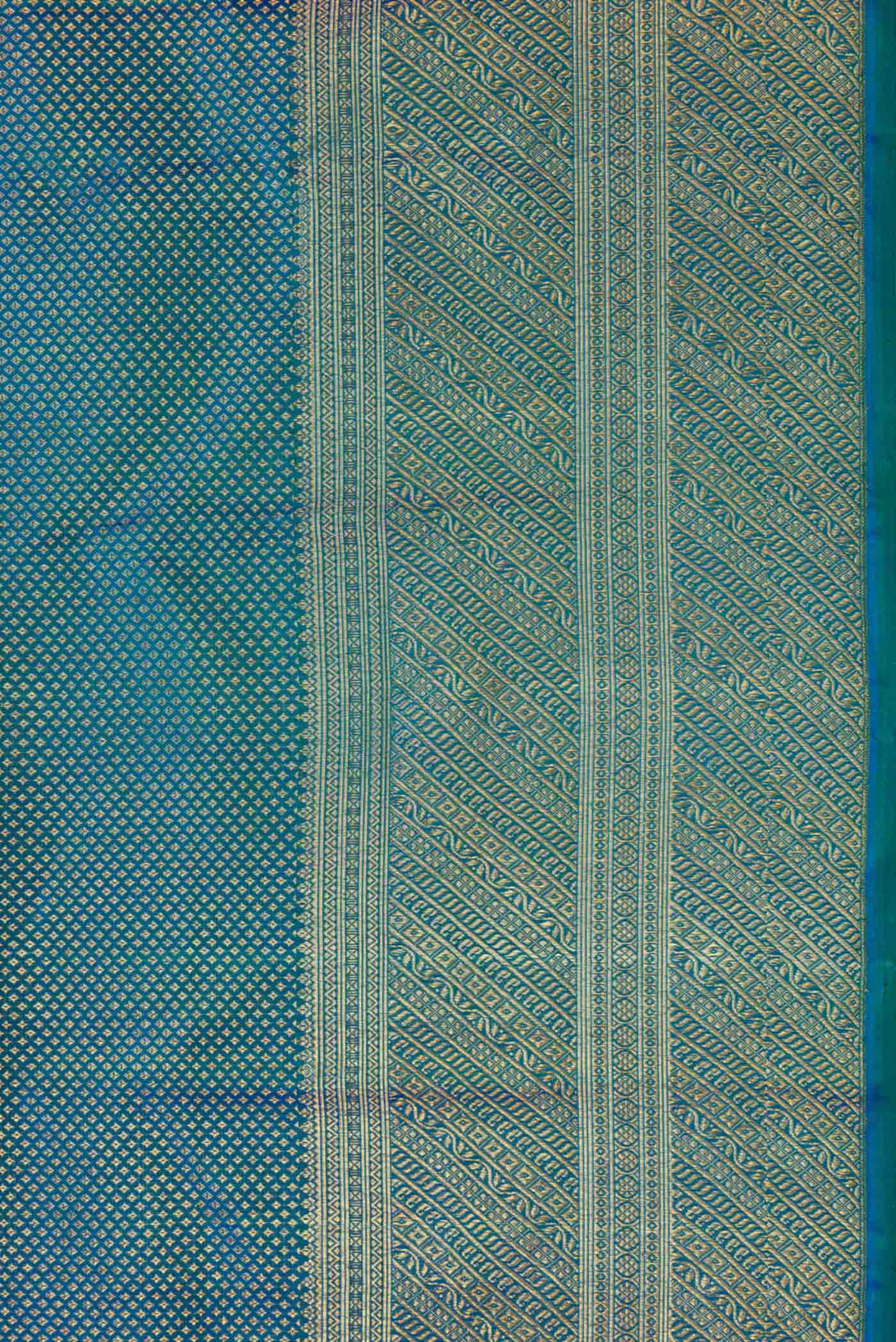 Border image of Peacock Blue Dual Tone Kanchipuram Silk Saree with Zari Brocade on the body and Zari Border. 